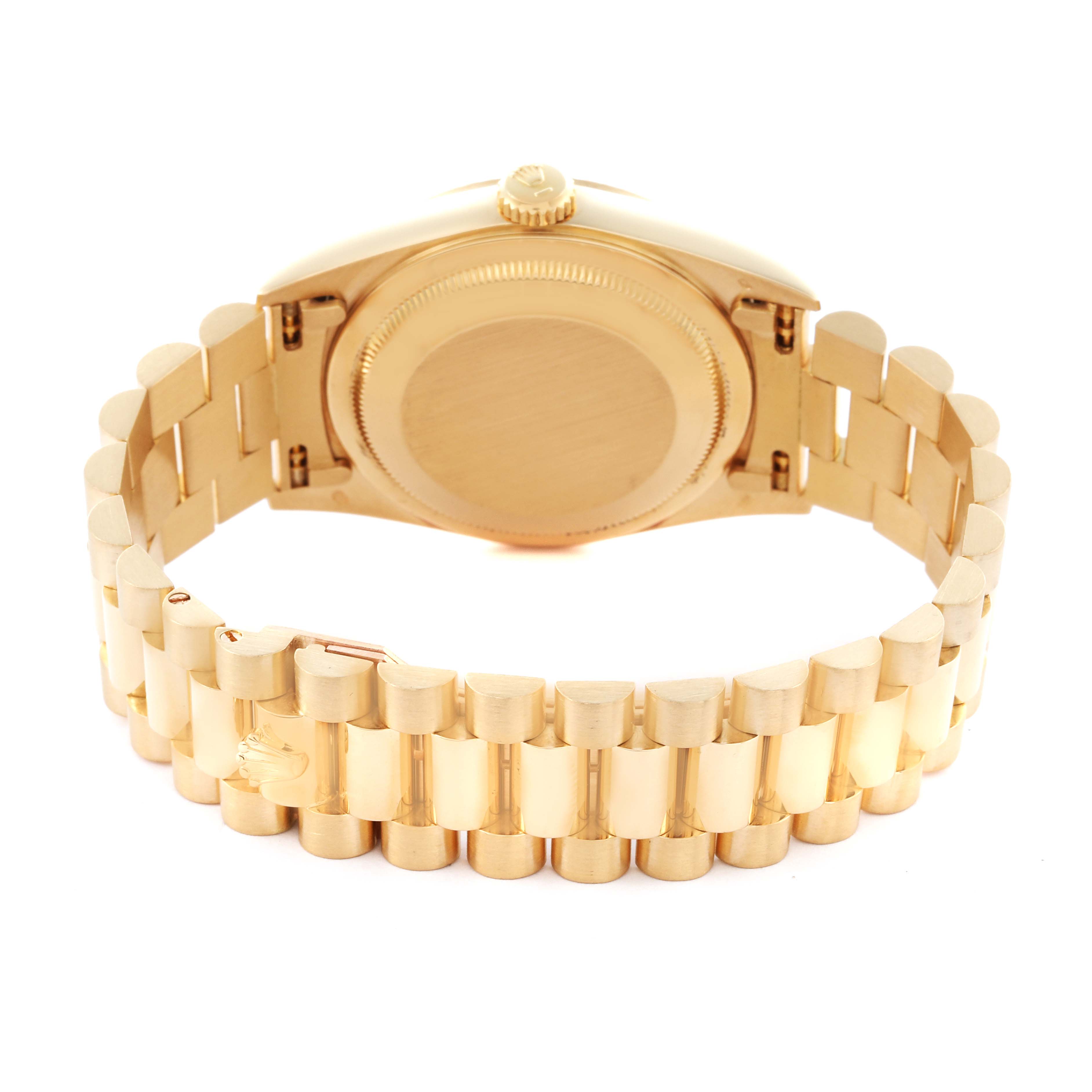 The Rolex Datejust watch is shown from the back, highlighting the case and bracelet.