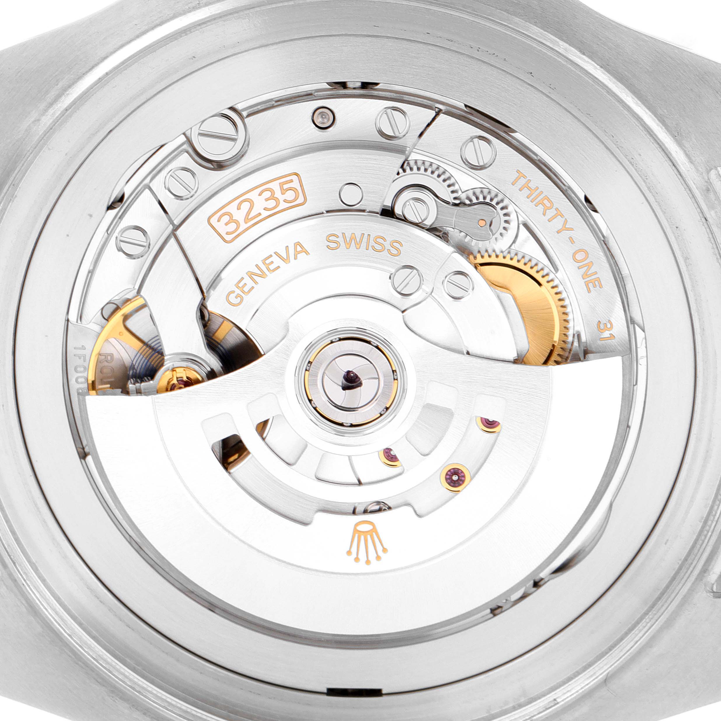 The image shows the back view of a Rolex Sea-Dweller 126660 Men
s Stainless Steel Blue Dial 126660 Men
s Stainless Steel Blue Dial watch, highlighting its inner mechanical movements and components.