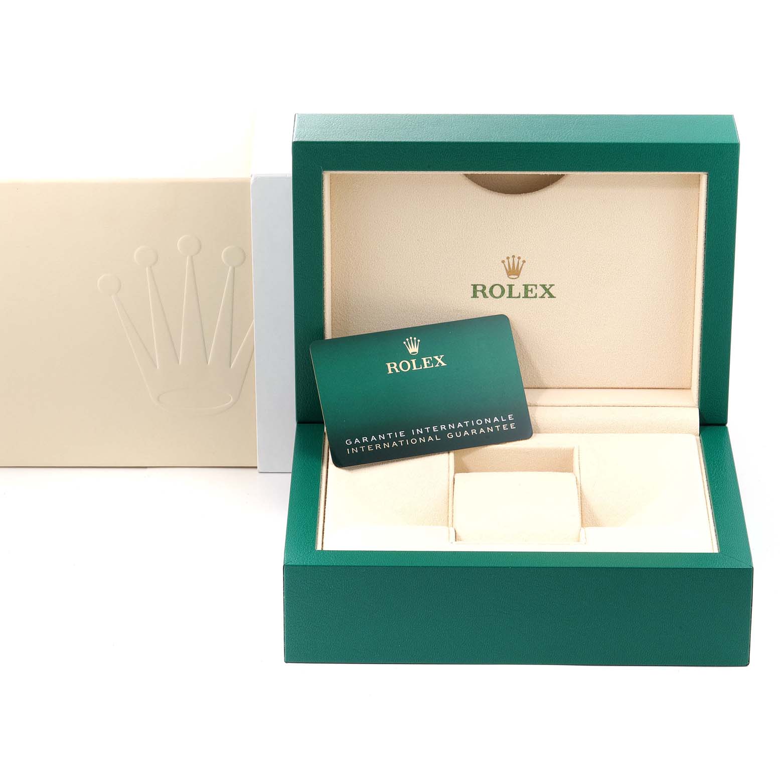 The image shows the empty green and beige box and international guarantee card for a Rolex Sea-Dweller 126660 Men
s Stainless Steel Blue Dial 126660 Men
s Stainless Steel Blue Dial.