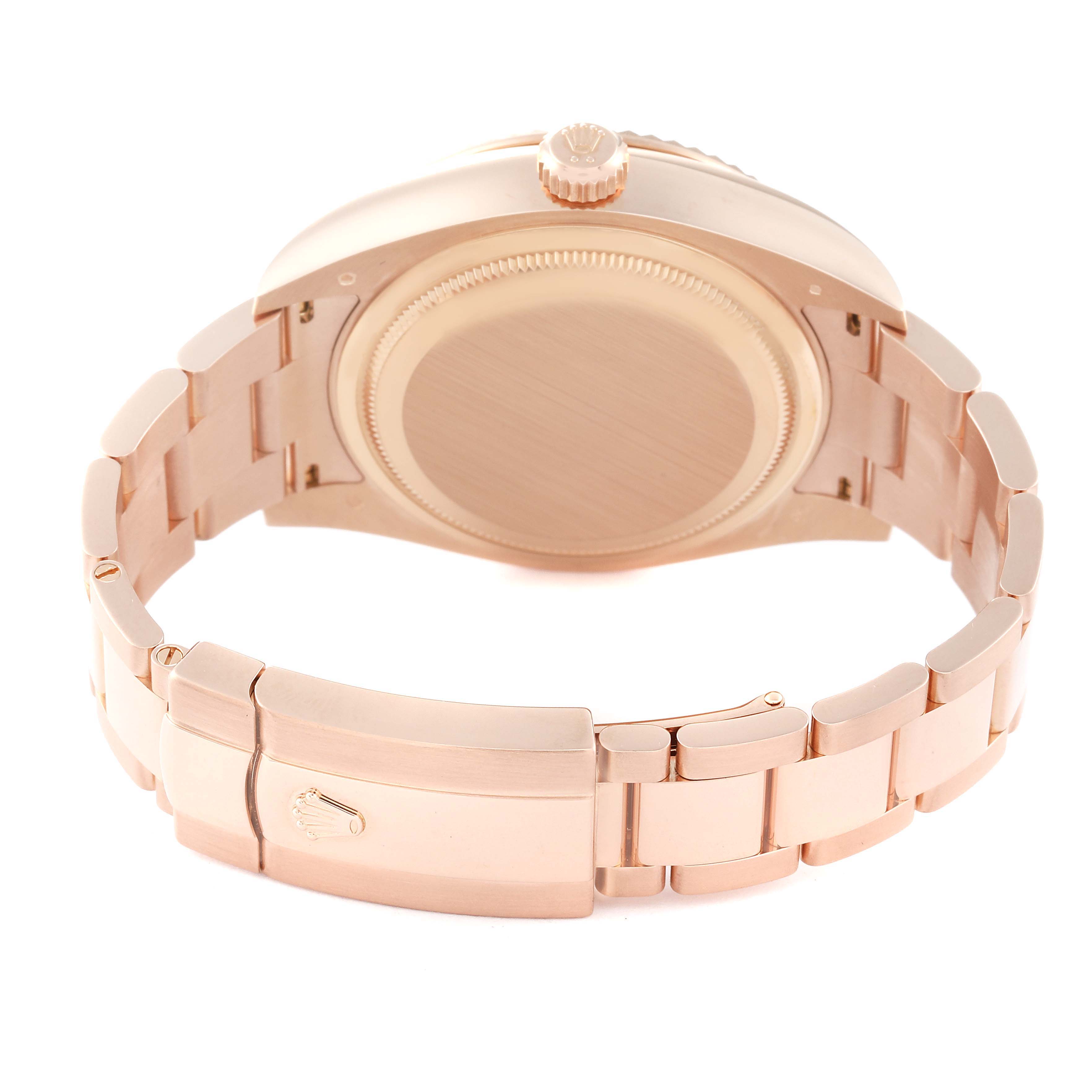 The image shows the back view of a Rolex Sky-Dweller 326935 Men's Rose Gold Pink Dial 326935 Men's Rose Gold Pink Dial watch, focusing on the case back, crown, and bracelet clasp.