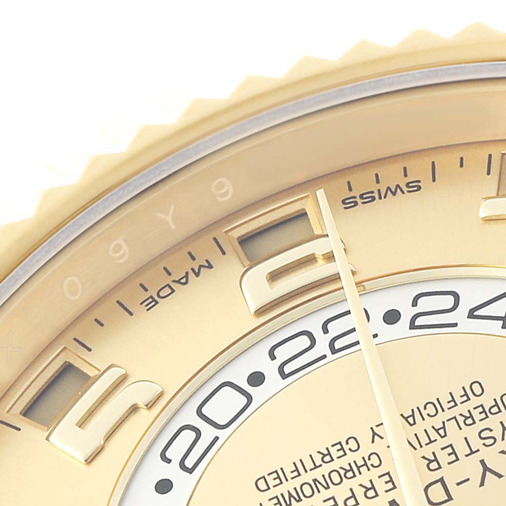 The image shows a close-up of the Rolex Sky-Dweller 326938 Men's Yellow Gold Champagne Dial watch face, highlighting details of the bezel, dial, and part of the hour hand.