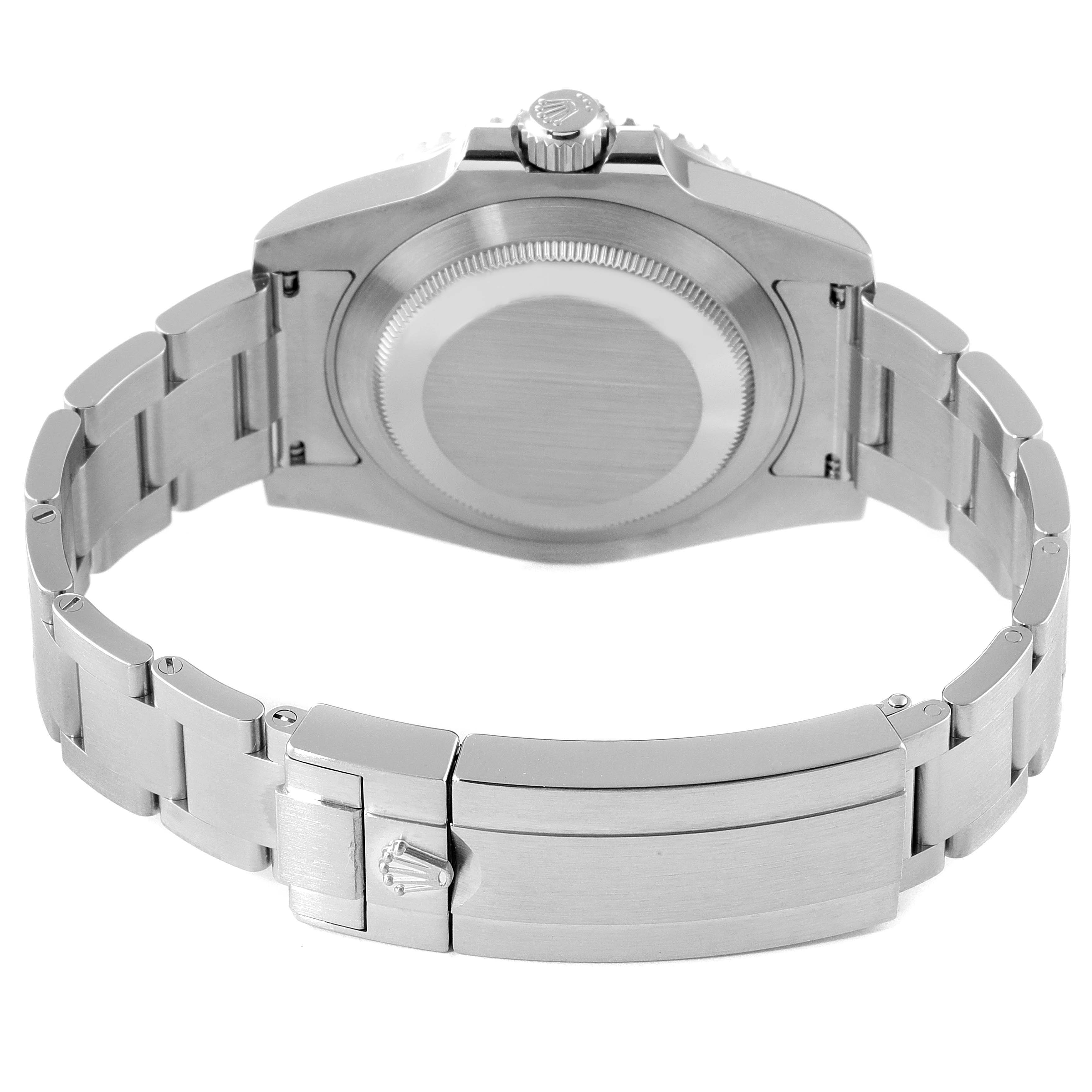 The image shows the back view of the Rolex Submariner 114060 Men
s Stainless Steel Black Dial 114060 Men
s Stainless Steel Black Dial, focusing on the case back and metal bracelet with clasp.