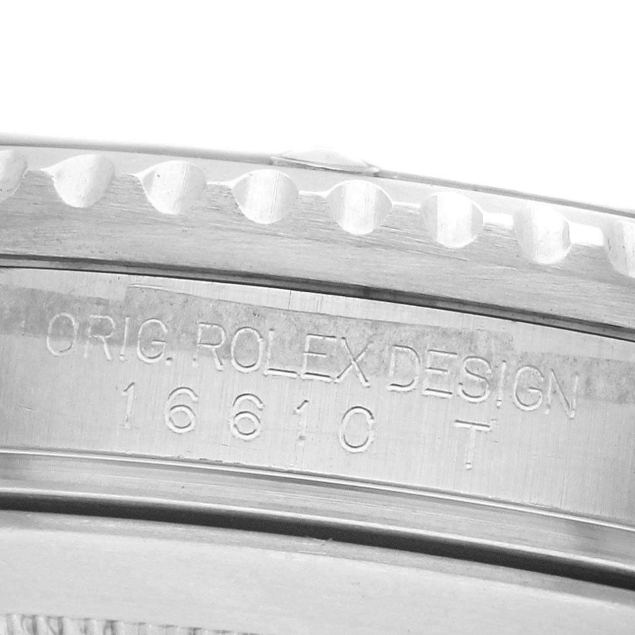 The image shows the engraved side view of the bezel and case of a Rolex Submariner 16610 Men's Stainless Steel Black Dial.