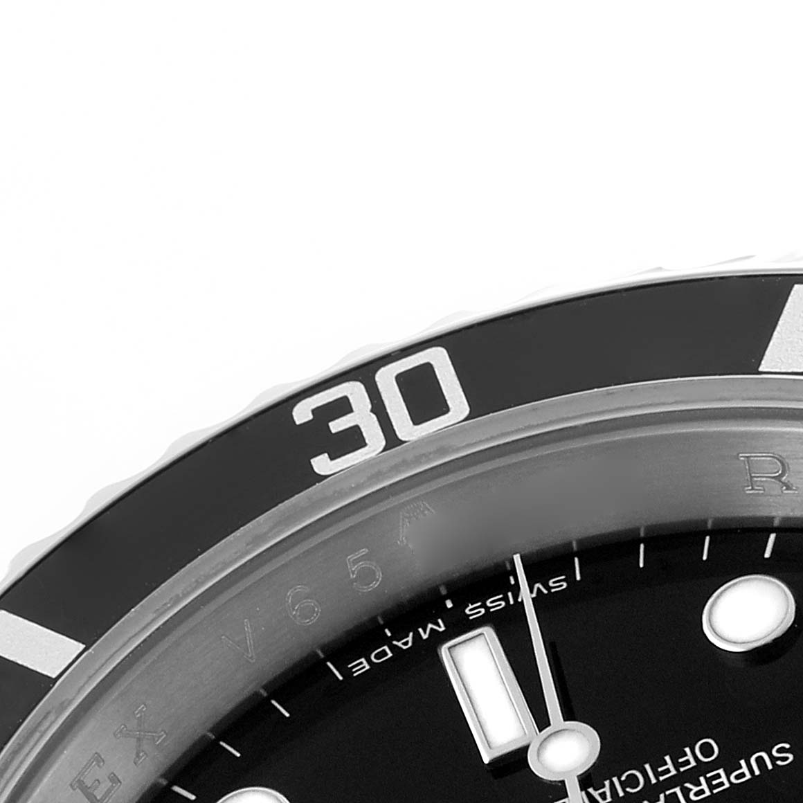 The image shows a close-up of the bezel and part of the dial of a Rolex Submariner 16610 Men's Stainless Steel Black Dial watch, highlighting the 30-minute marker.