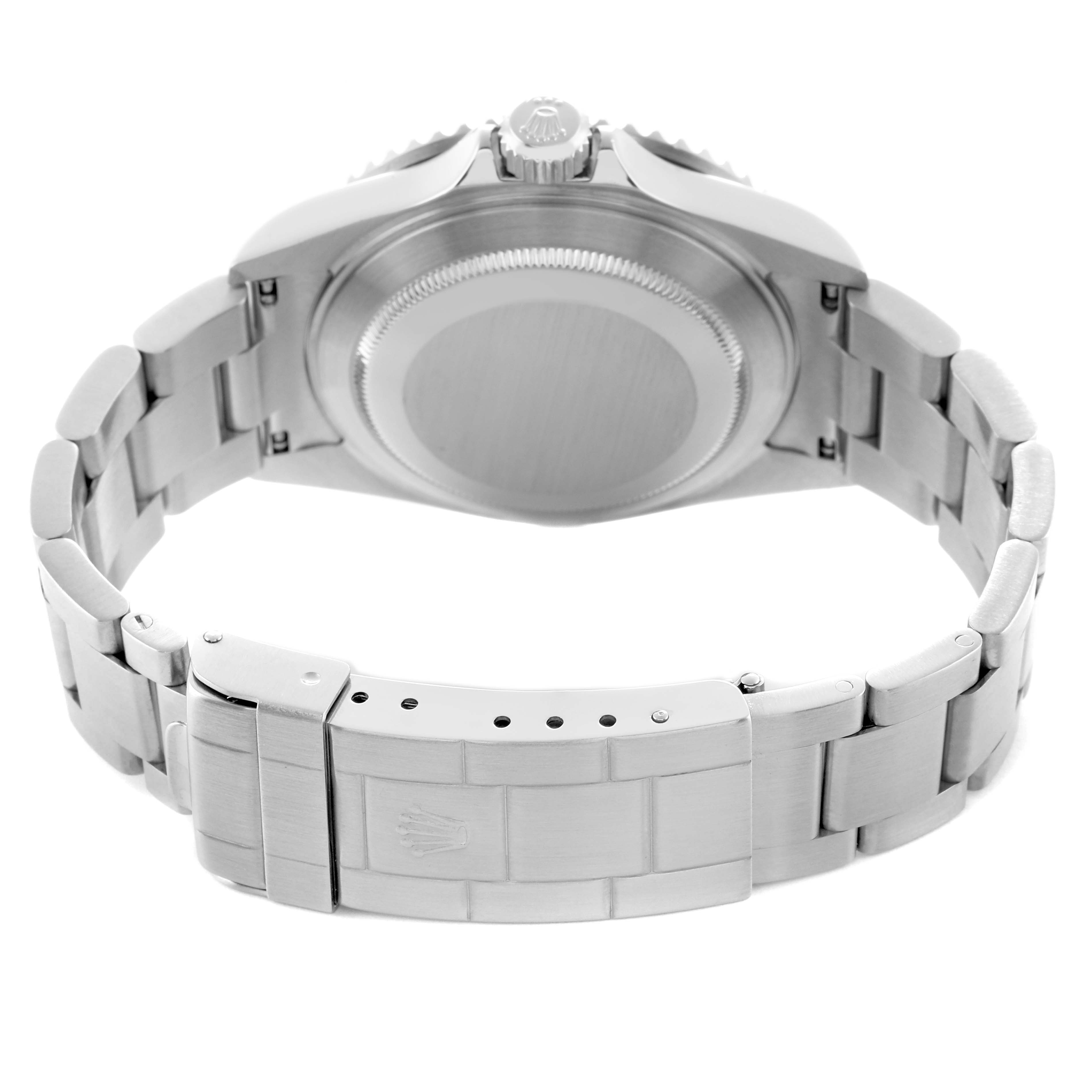 The Rolex Submariner 16610 Men's Stainless Steel Black Dial watch is shown from the back, highlighting the case back and bracelet clasp.