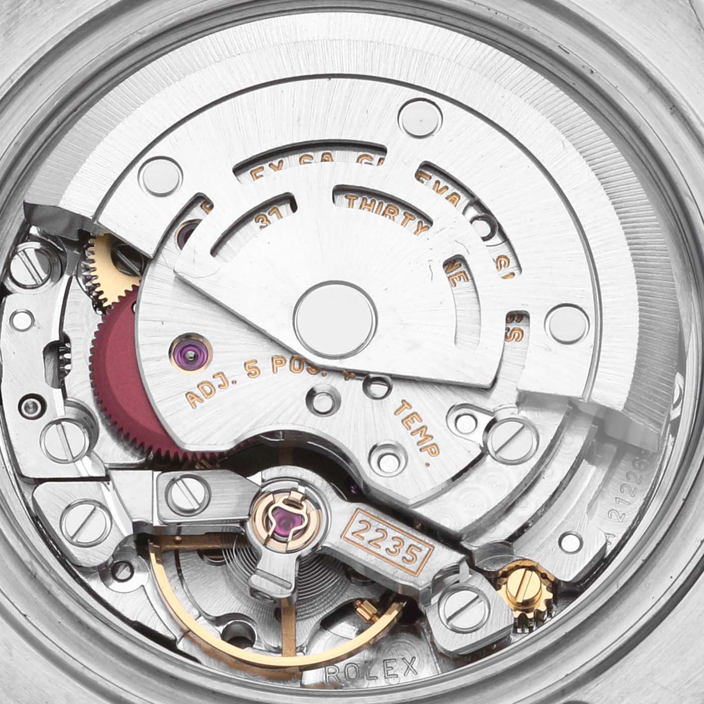 The image shows the Rolex Yacht-Master 169623 Women
s Steel and Gold (two tone) White Dial 169623 Women
s Steel and Gold (two tone) White Dial
s movement and intricate internal mechanisms from a close-up angle.