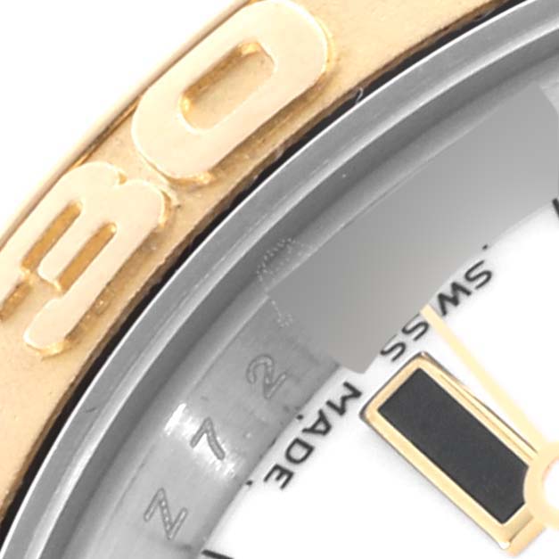 The close-up shows the bezel edge and partial dial of the Rolex Yacht-Master 169623 Women
s Steel and Gold (two tone) White Dial 169623 Women
s Steel and Gold (two tone) White Dial, with a focus on the gold detailing.