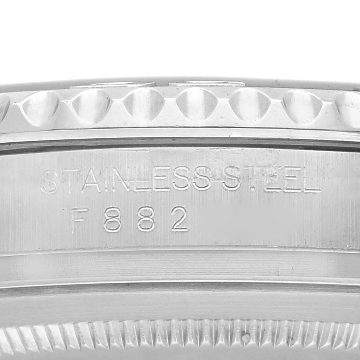 The image shows a close-up of the stainless steel case of a Rolex Yacht-Master 16622 Men's Stainless Steel Silver Dial 16622 Men's Stainless Steel Silver Dial watch, with part of the bezel and serial number visible.