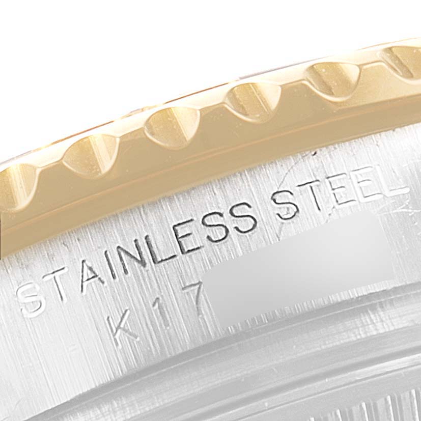 The image shows a close-up of the bezel and case back of a Rolex Yacht-Master 169623 Women's Steel and Gold (two tone) Blue Dial 169623 Women's Steel and Gold (two tone) Blue Dial watch, indicating "Stainless Steel."