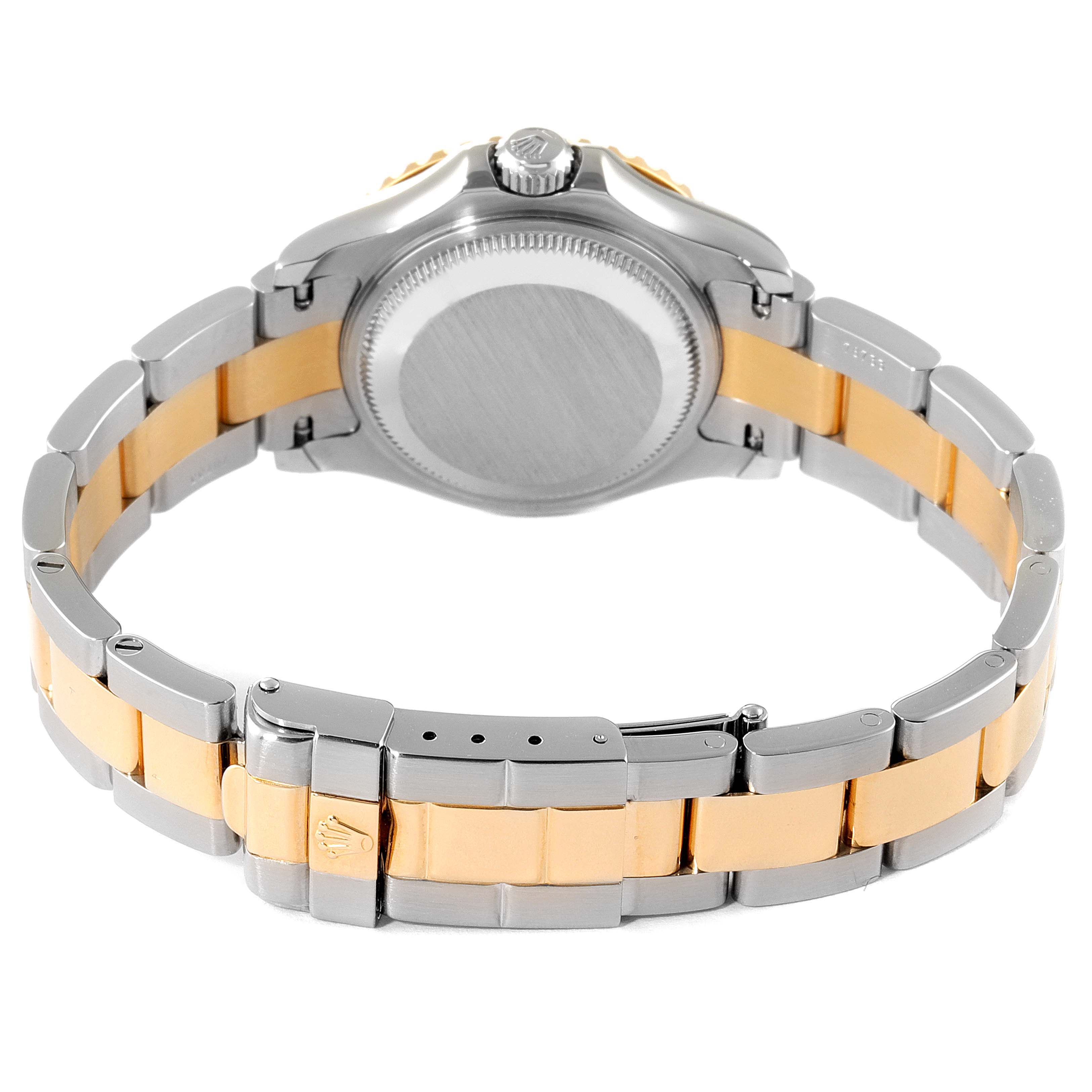 The image shows the back case, crown, and two-tone bracelet of a Rolex Yacht-Master 169623 Women's Steel and Gold (two tone) Blue Dial 169623 Women's Steel and Gold (two tone) Blue Dial watch.