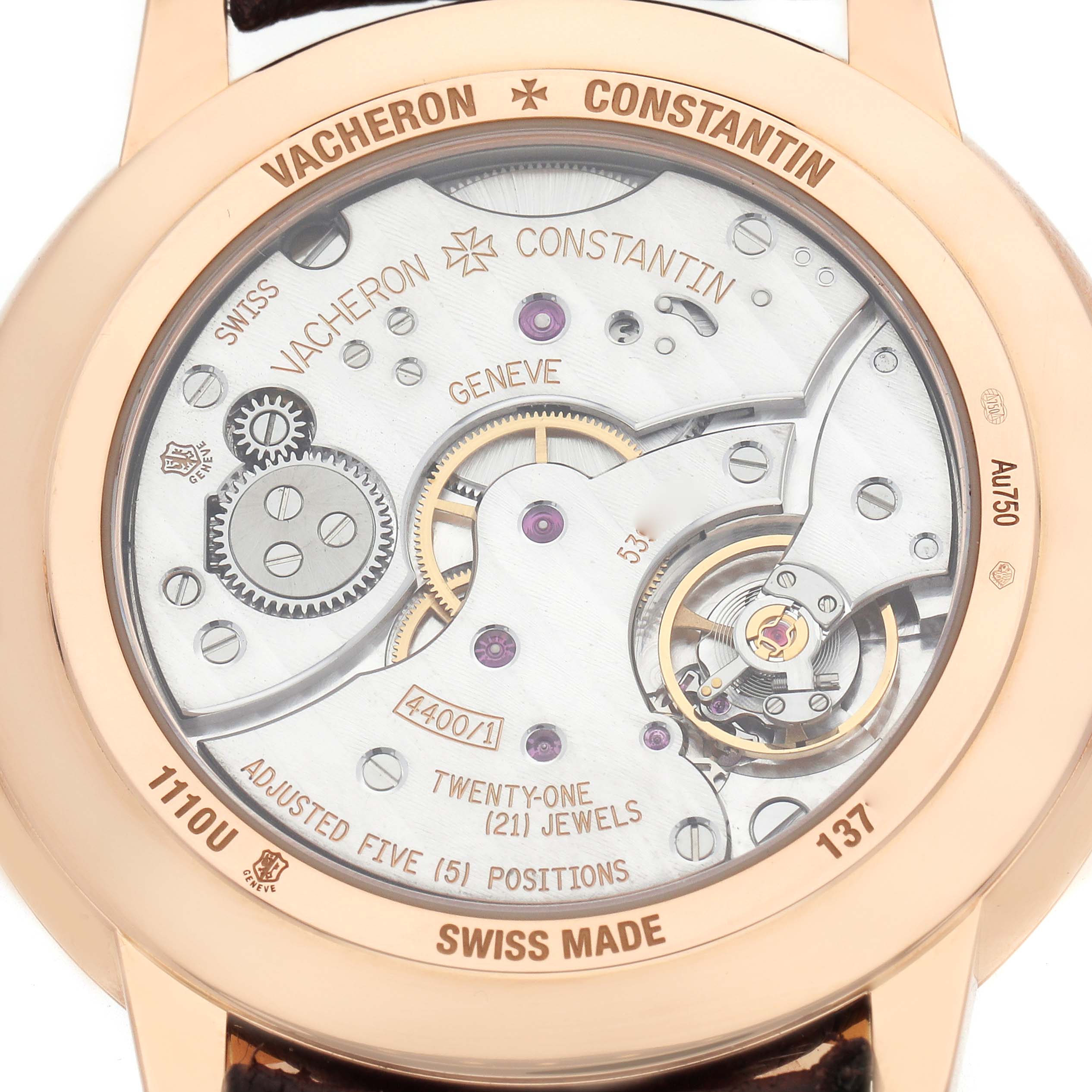 The image shows the case back of a Vacheron Constantin Patrimony 1110U/000R Men's Rose Gold Silver Dial watch, displaying its intricate mechanical movement.