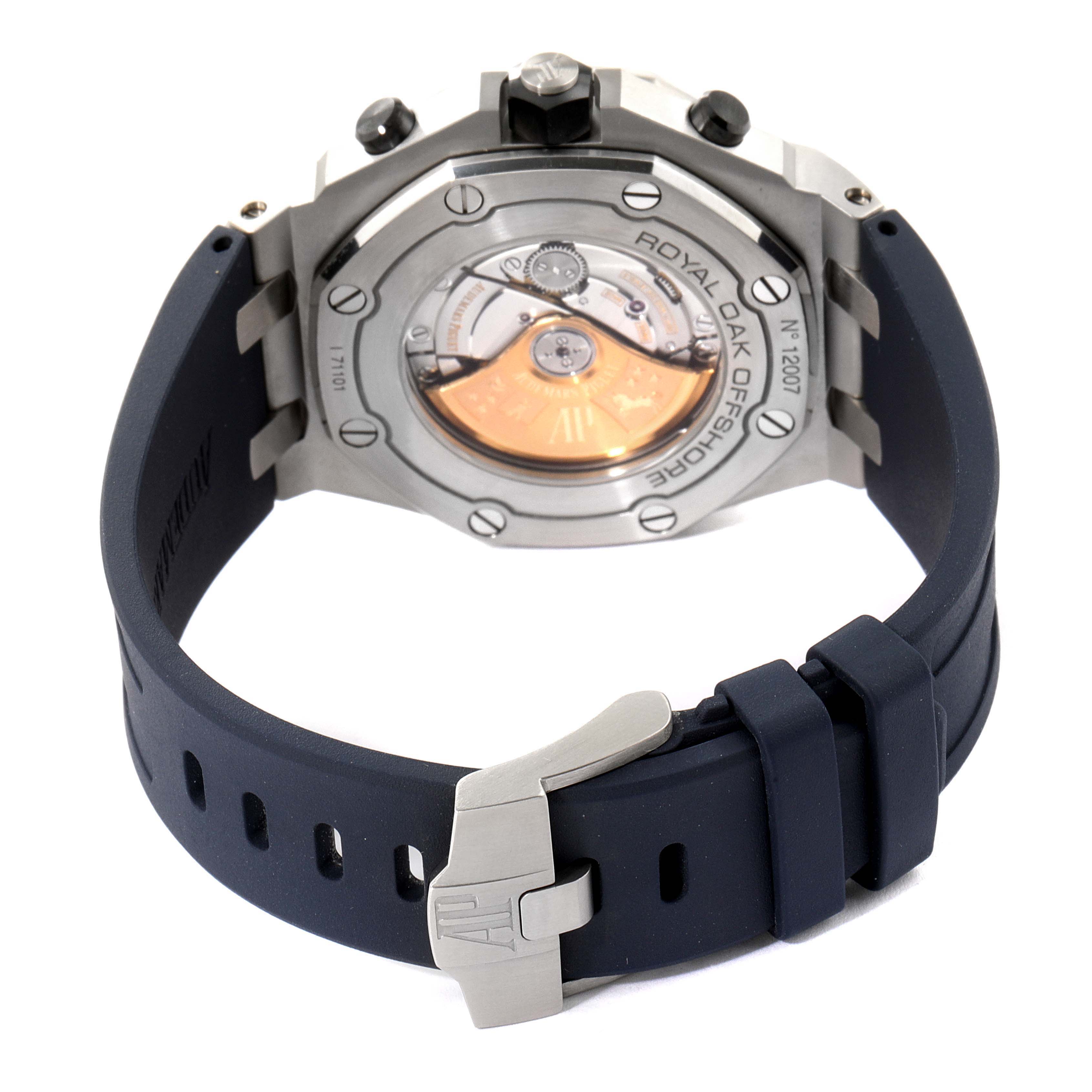 The image shows the back view of an Audemars Piguet Royal Oak Offshore 26470ST.OO.A027CA.01 Men's Stainless Steel Blue Dial 26470ST.OO.A027CA.01 Men's Stainless Steel Blue Dial watch, highlighting its case back, movement, and strap.