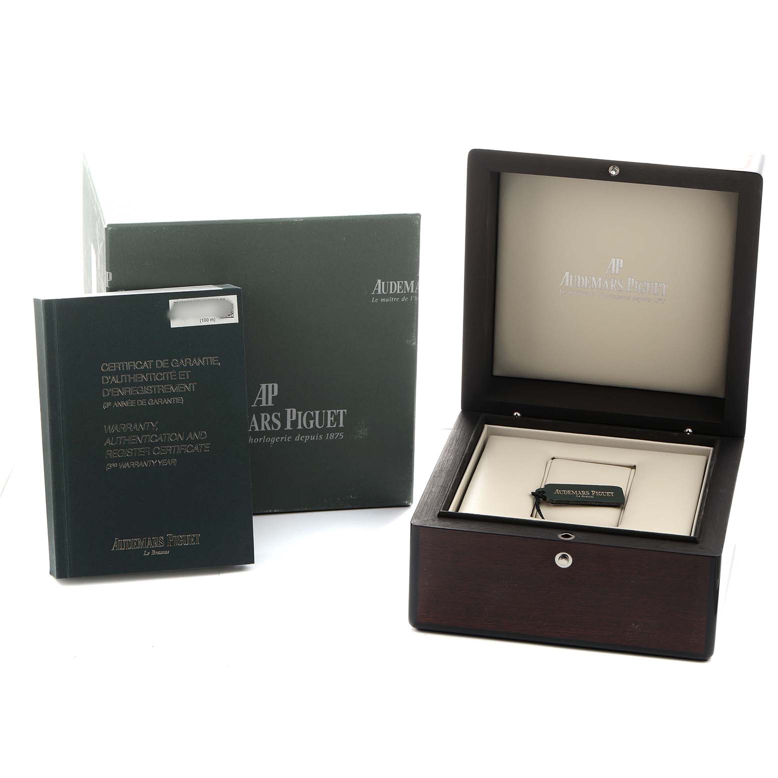 The image shows the packaging and accessories for an Audemars Piguet Royal Oak Offshore 26470ST.OO.A027CA.01 Men's Stainless Steel Blue Dial, including a box, booklet, and card.