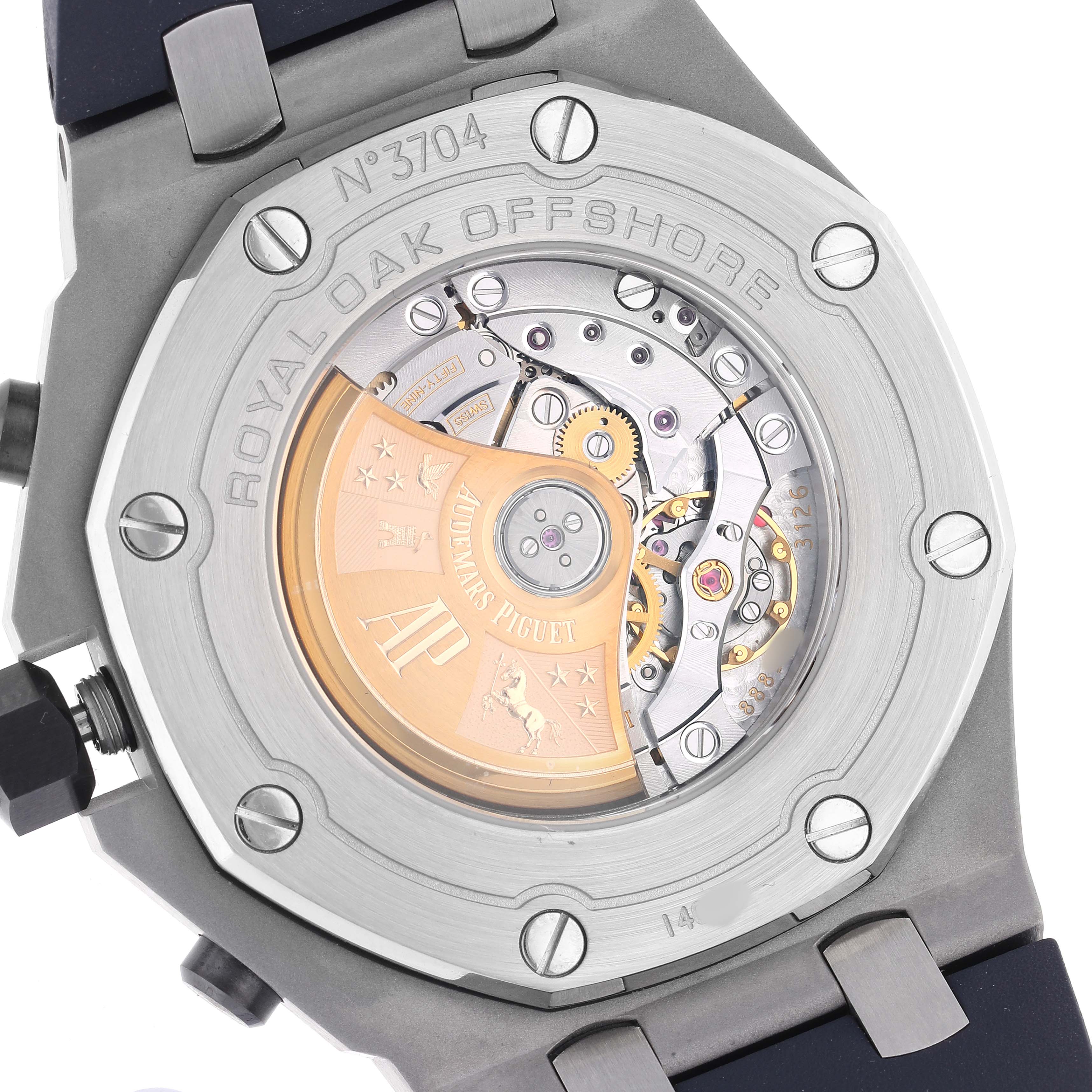 The image shows the back of the Audemars Piguet Royal Oak Offshore 26470ST.OO.A027CA.01 Men's Stainless Steel Blue Dial, highlighting the movement and rotor details.