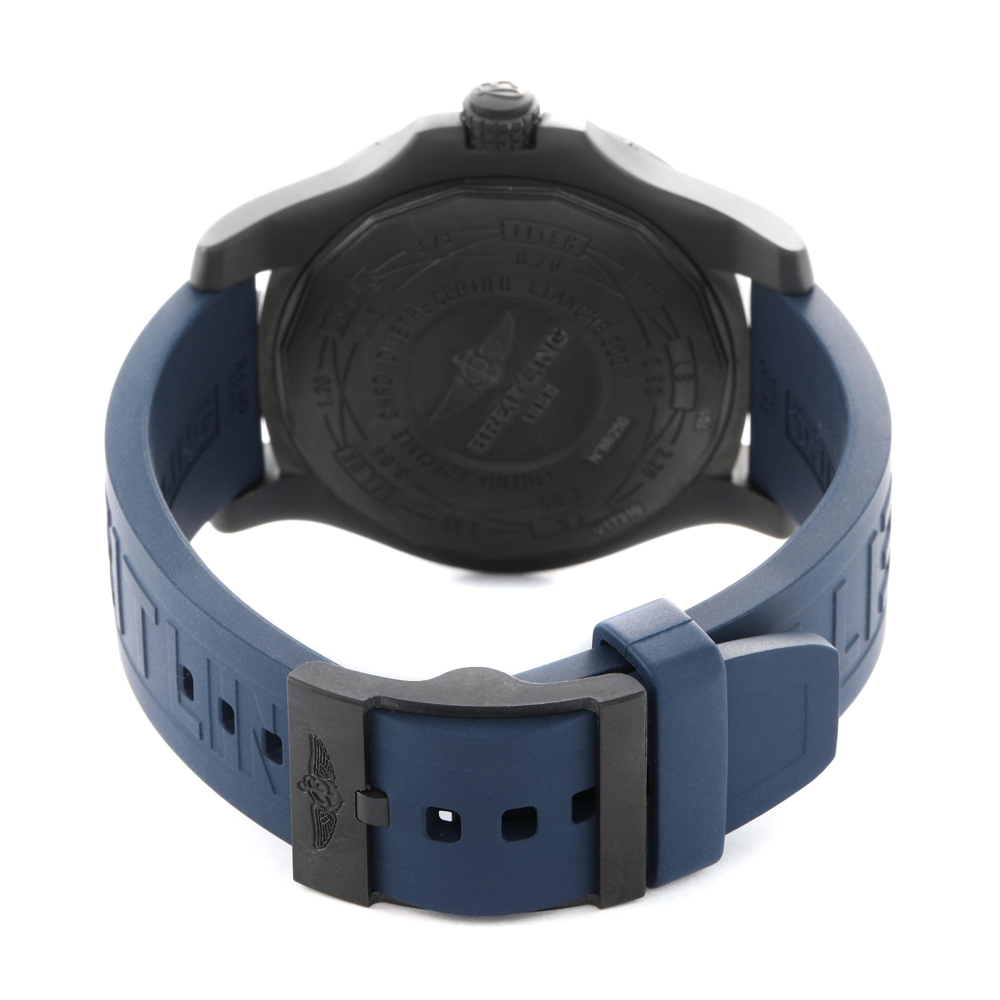 The image shows the back view of a Breitling Avenger V17310A/CA23 Men's Titanium Blue Dial watch focusing on the case back and blue strap with buckle.