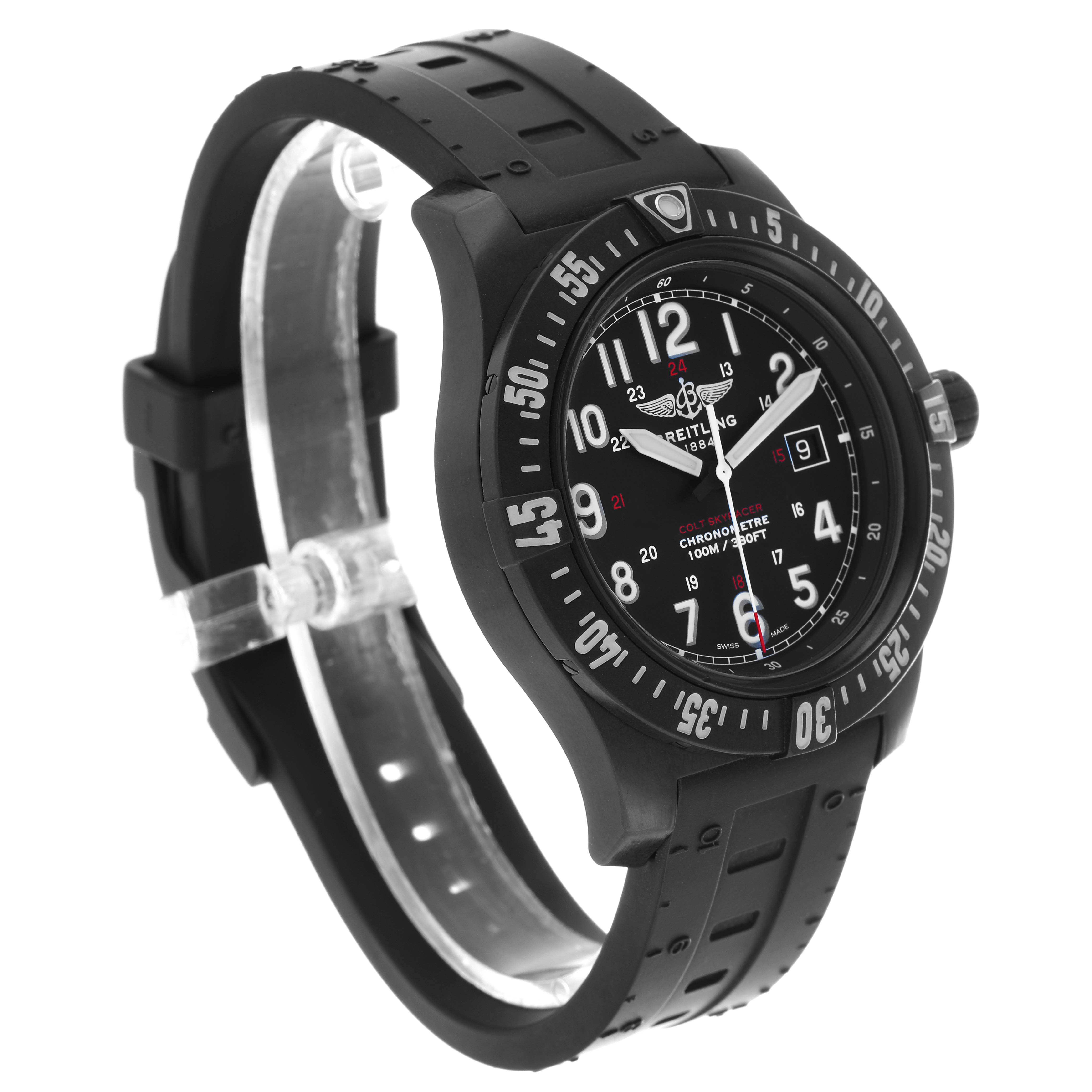 The image shows a side angle of a Breitling Colt X74320E4/BF87 Men's Titanium Black Dial watch, highlighting its black dial, bezel, and rubber strap.