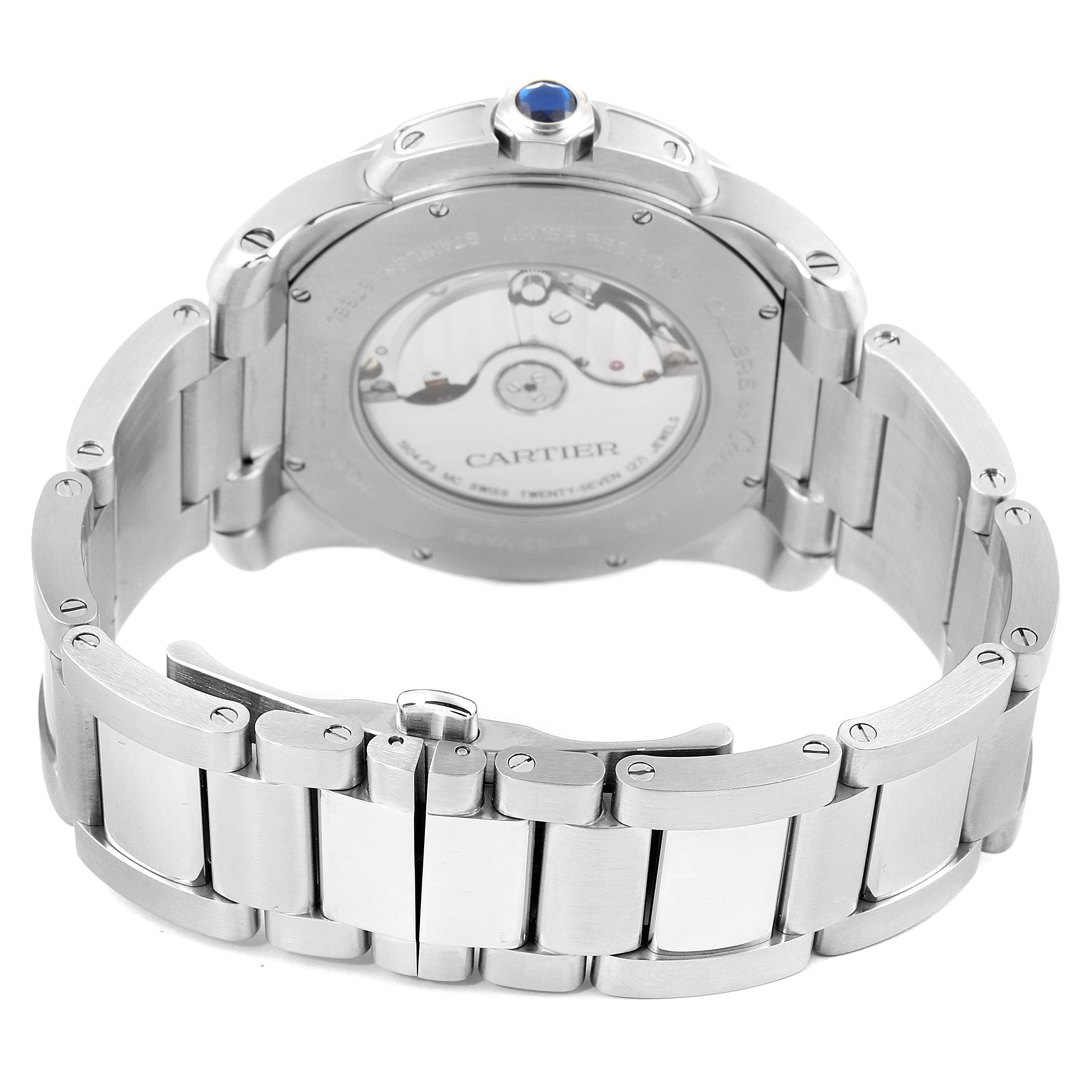 The image shows the back and side view of the Calibre de Cartier watch by Cartier, including the bracelet and mechanical components.