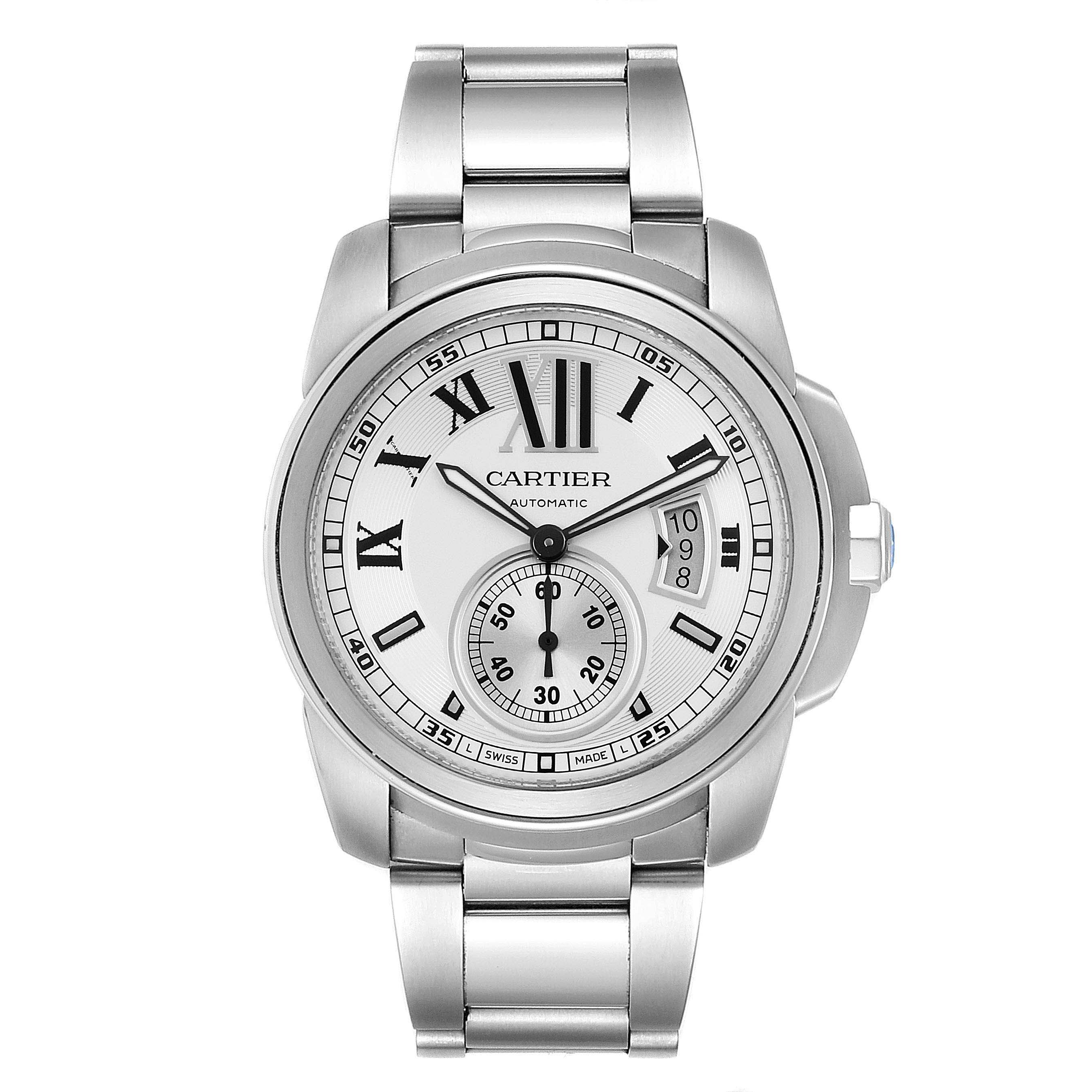 This image shows a front angle of the Calibre de Cartier watch by Cartier, displaying its face, bezel, and bracelet.