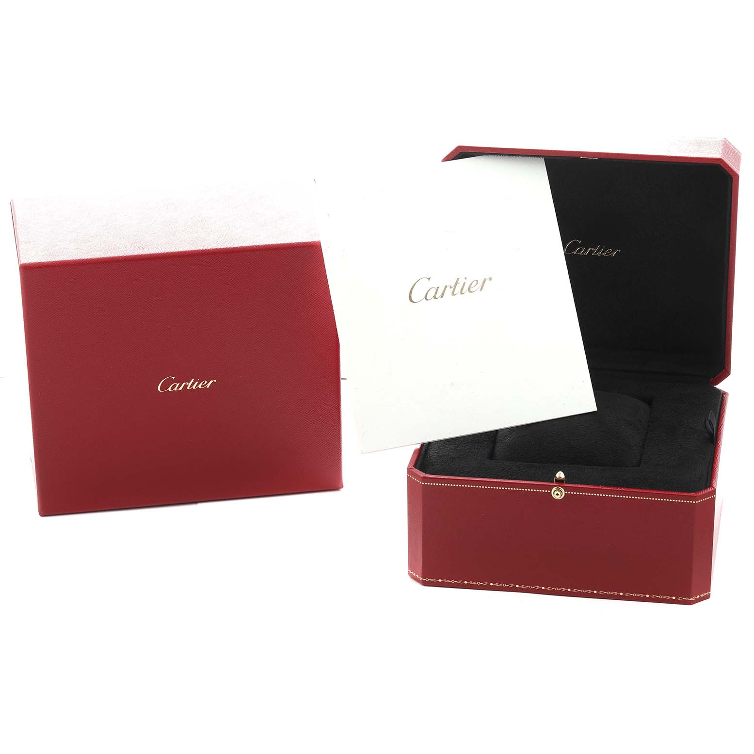The image shows an open red Cartier box and a closed one, with a white Cartier booklet on top, likely for the Baignoire model.