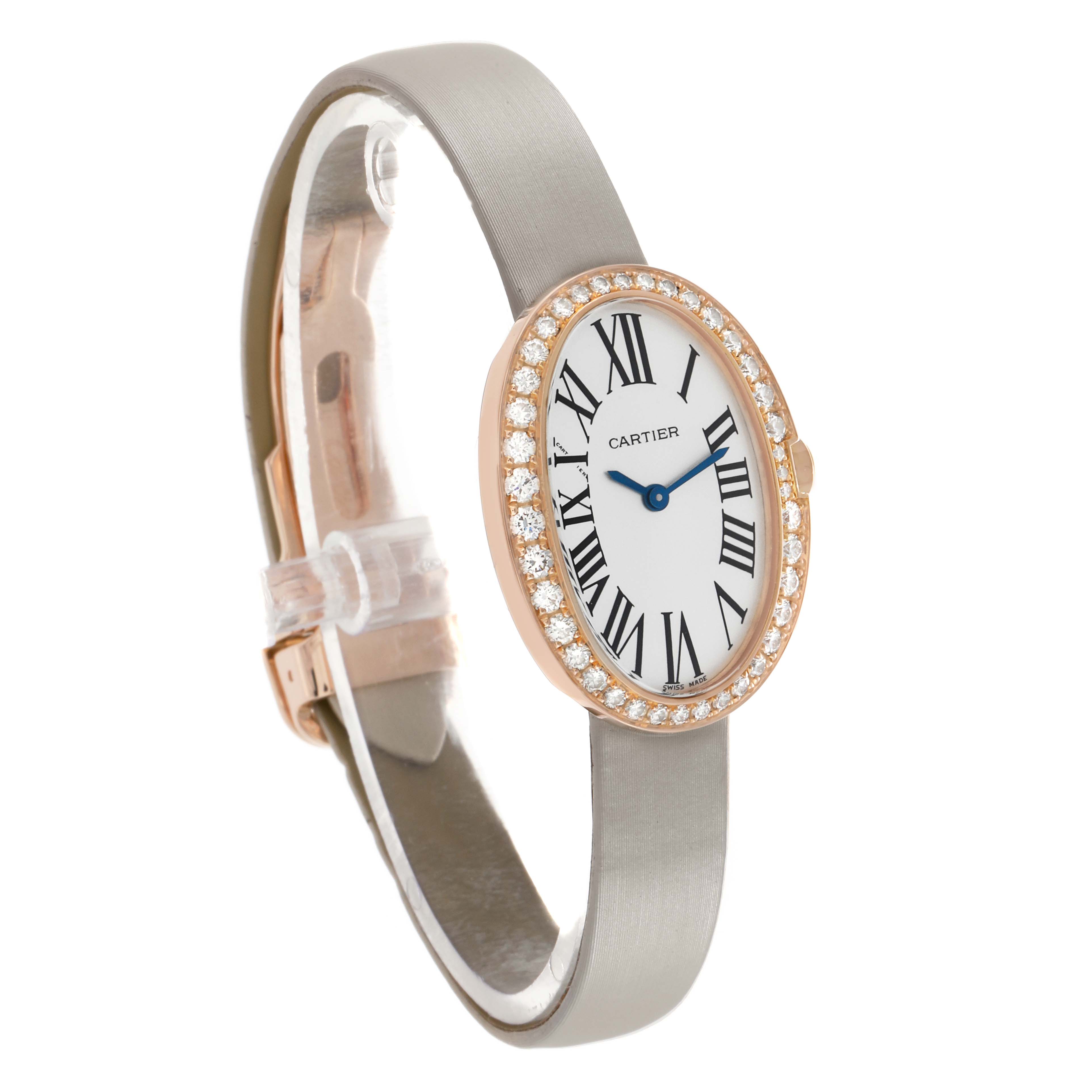 The Cartier Baignoire WB520004 Women's Rose Gold Silver Dial watch is shown at a slight side angle, displaying its oval face, diamond bezel, and leather strap.