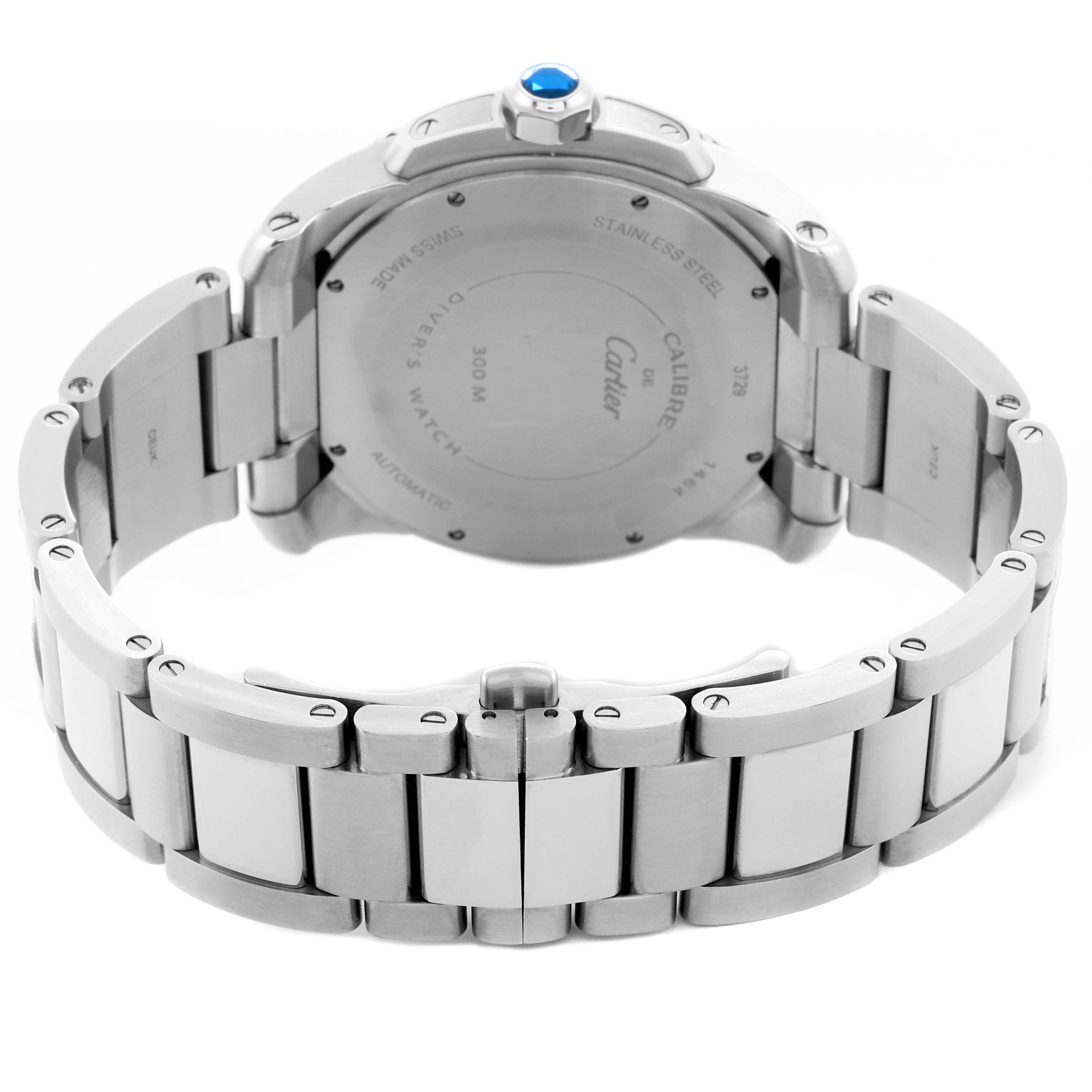 The image shows the back and bracelet of the Calibre de Cartier watch, highlighting the stainless steel case and clasp.