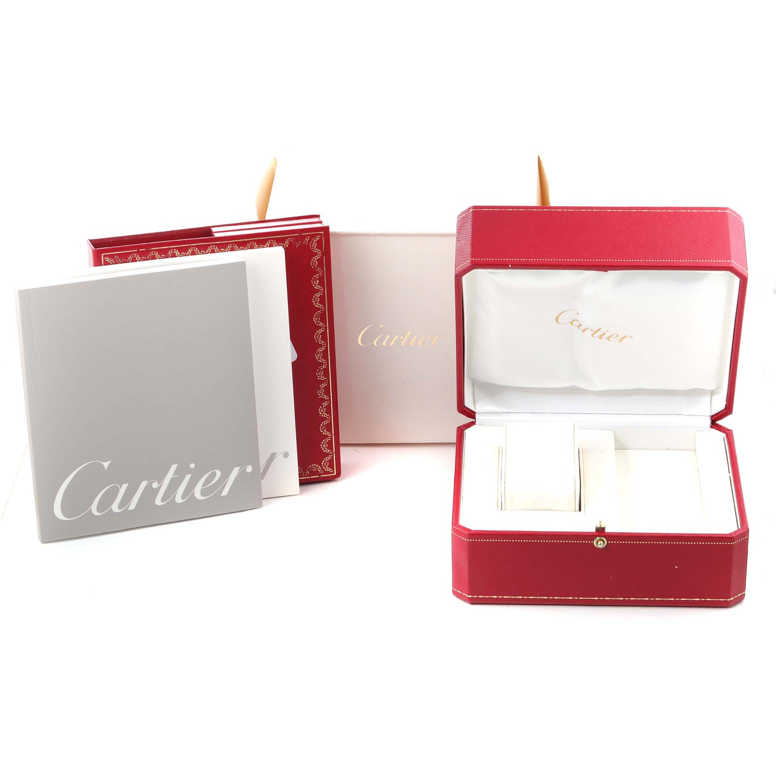 This image shows the packaging and manual for the Cartier Roadster W62031Y4 Men
s Steel and Gold (two tone) Silver Dial W62031Y4 Men
s Steel and Gold (two tone) Silver Dial model, including a red box and documentation.