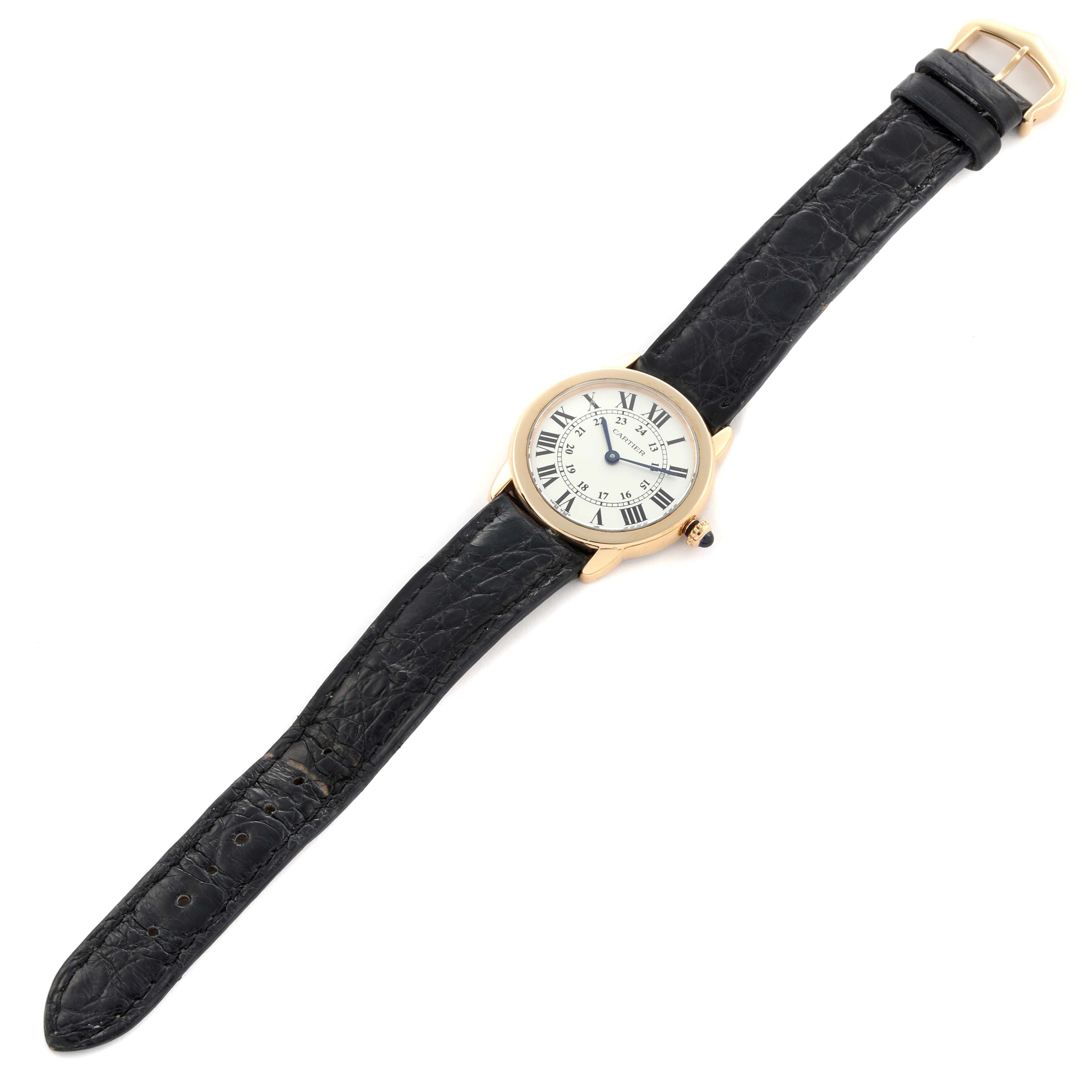 The Cartier Ronde W6700355 Women's Steel and Gold (two tone) Silver Dial W6700355 Women's Steel and Gold (two tone) Silver Dial watch is shown at an angle displaying the face, crown, and full black leather strap.