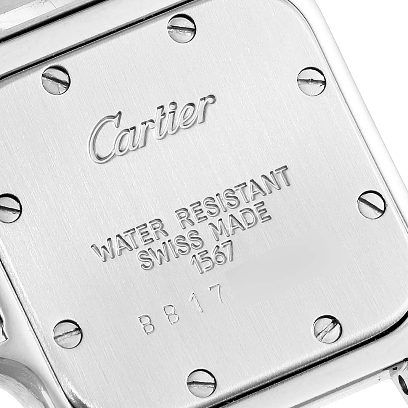 This is the back case of a Cartier Santos W20012C4 Women's Steel and Gold (two tone) Silver Dial W20012C4 Women's Steel and Gold (two tone) Silver Dial watch, showing the brand's engraving and water resistance details.