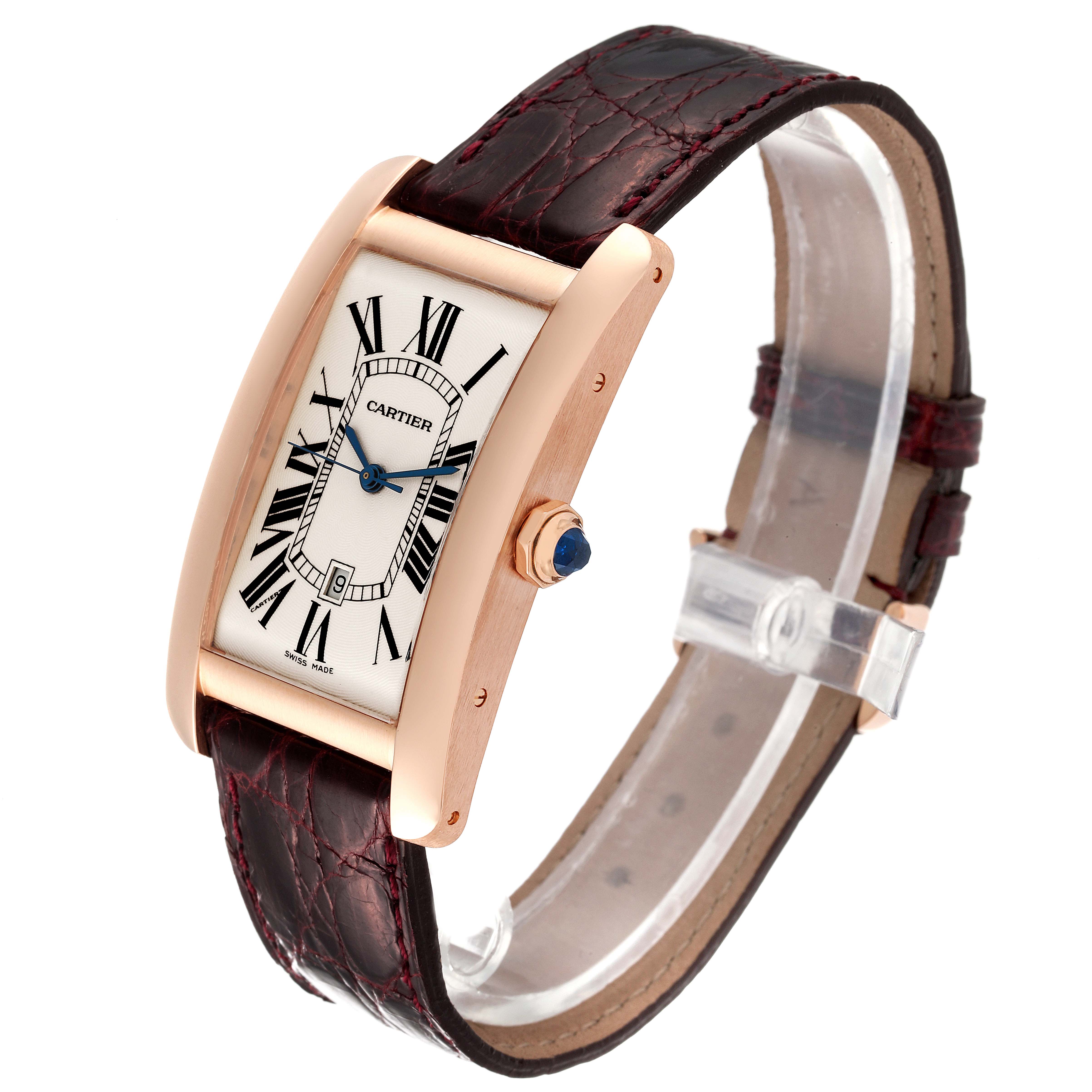 The image shows a Cartier Tank Américaine watch angled from the side, highlighting its rectangular face, leather strap, and crown with a blue gemstone.