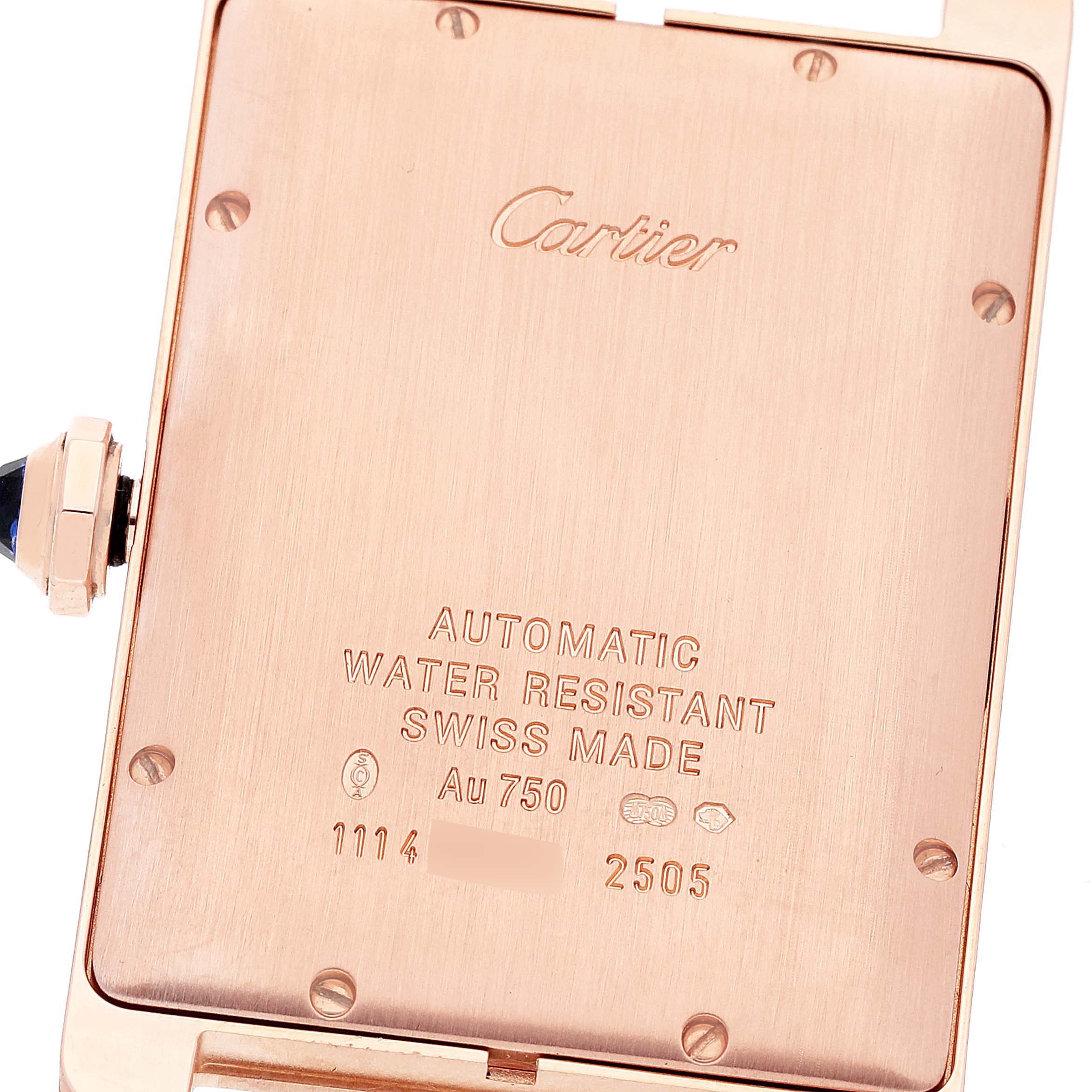 The image shows the back casing and part of the crown of a Cartier Tank Americaine W2609156 Men
s Rose Gold Silver Dial W2609156 Men
s Rose Gold Silver Dial watch.