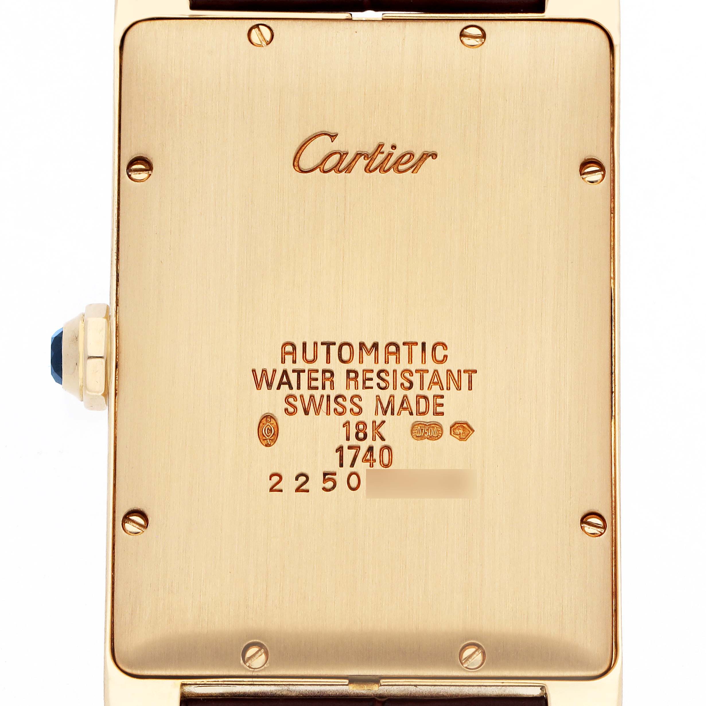 The image shows the back of a Cartier Tank Americaine W2603156 Men's Yellow Gold Silver Dial watch, including details like the brand, material, and water resistance.