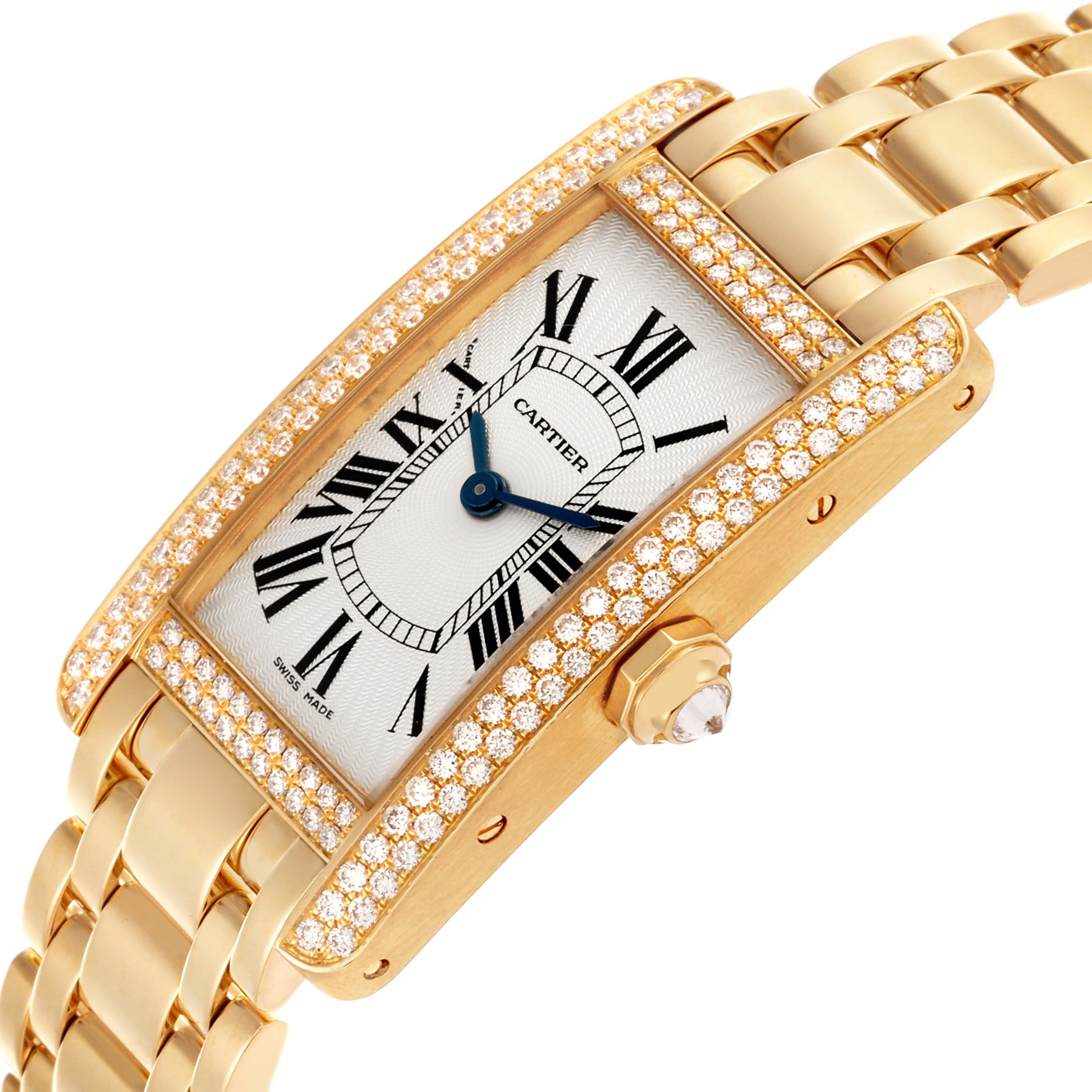 The Cartier Tank Americaine WB7012K2 Women's Yellow Gold Silver Dial WB7012K2 Women's Yellow Gold Silver Dial watch is shown at an angle displaying its rectangular face, gold bracelet, diamond-set bezel, and side crown.