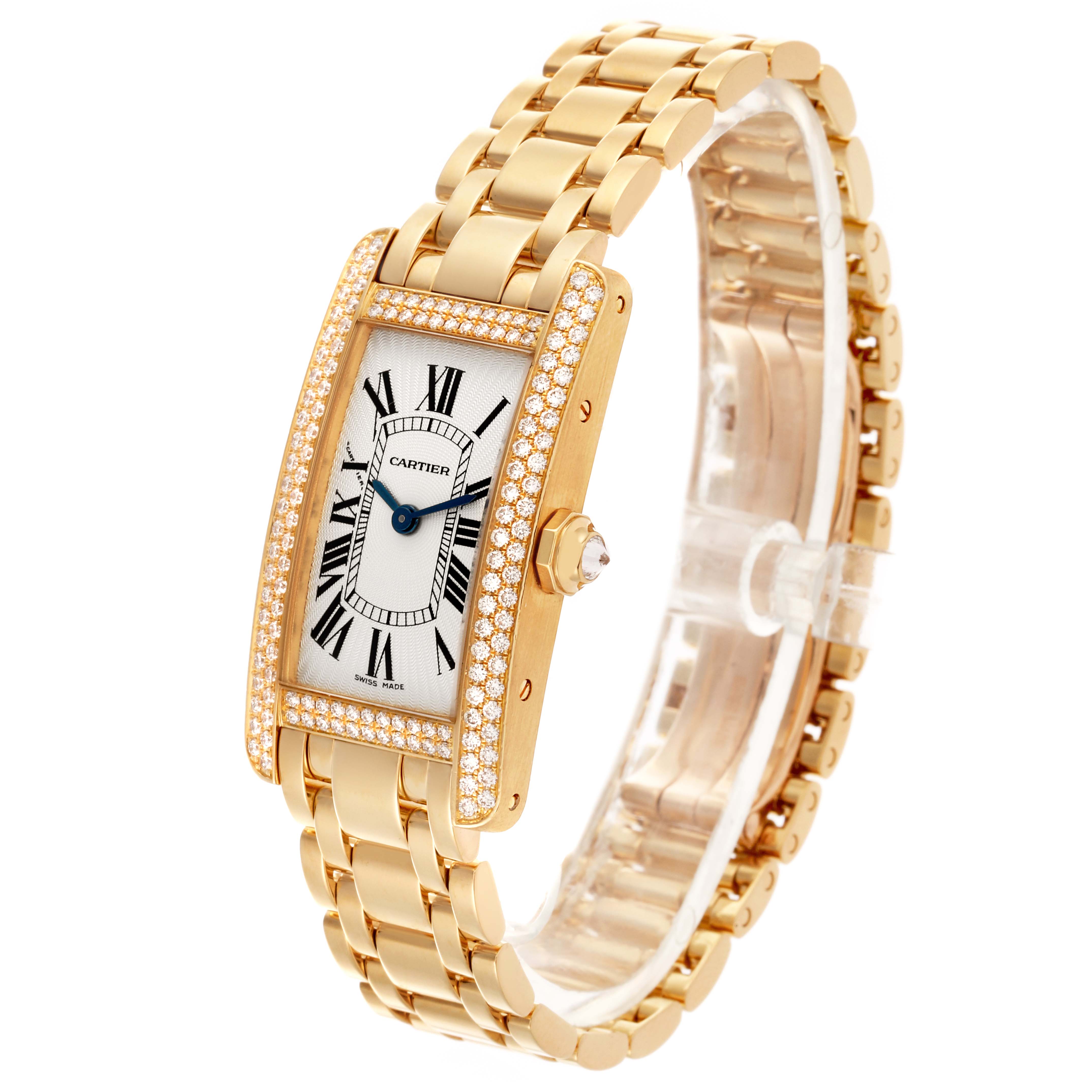 The Cartier Tank Americaine WB7012K2 Women's Yellow Gold Silver Dial WB7012K2 Women's Yellow Gold Silver Dial watch is shown at a three-quarter angle, displaying its gold rectangular face with a diamond bezel and gold bracelet.