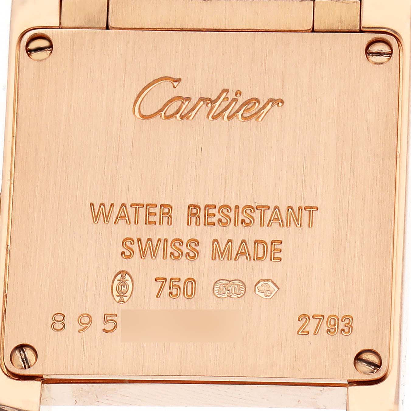 The image shows the back of a Cartier Tank Française watch, highlighting the brand logo and inscriptions.