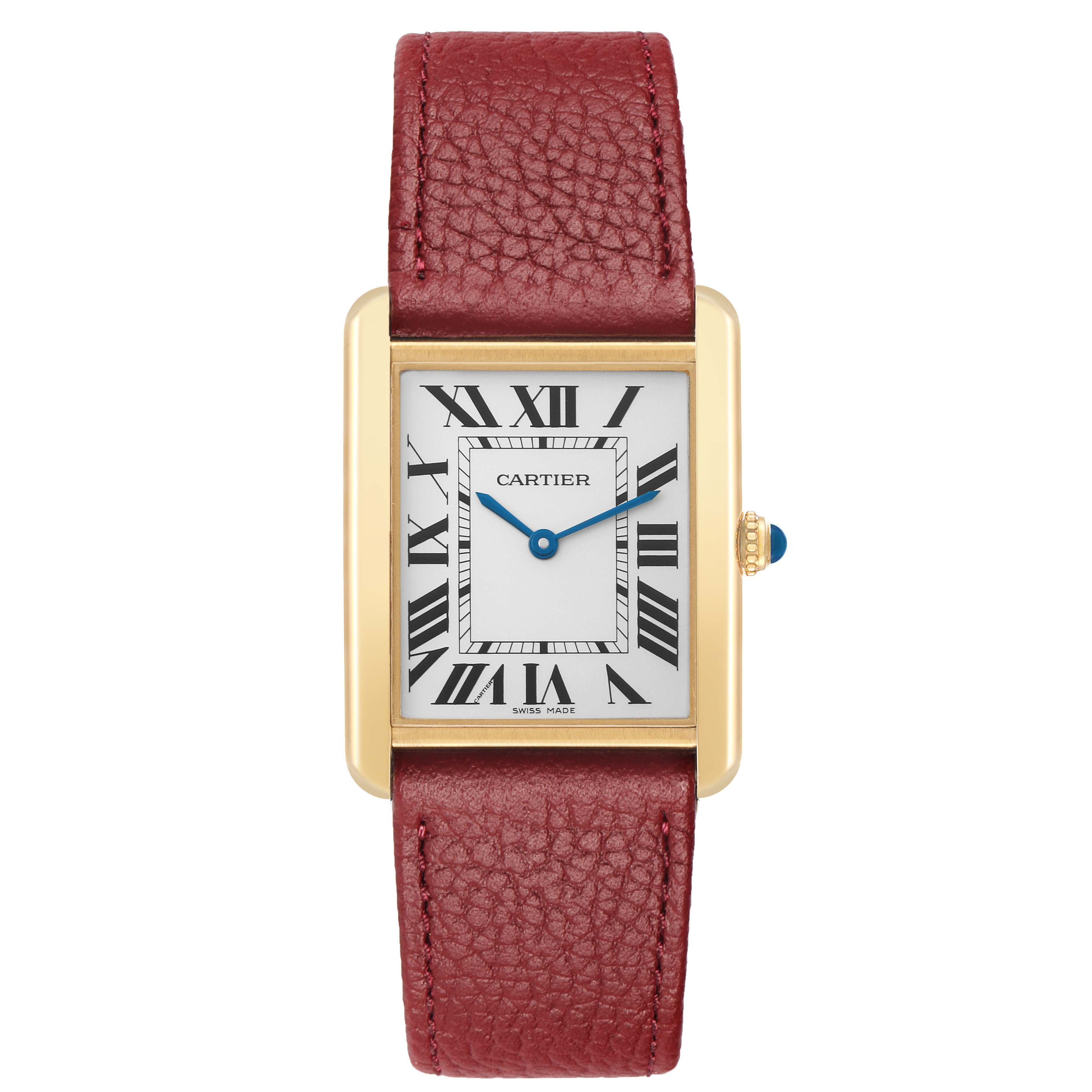 The Cartier Tank Solo W1018855 Men's Yellow Gold Silver Dial watch is shown from the front, displaying the face, case, and strap with Roman numerals and blue hands.