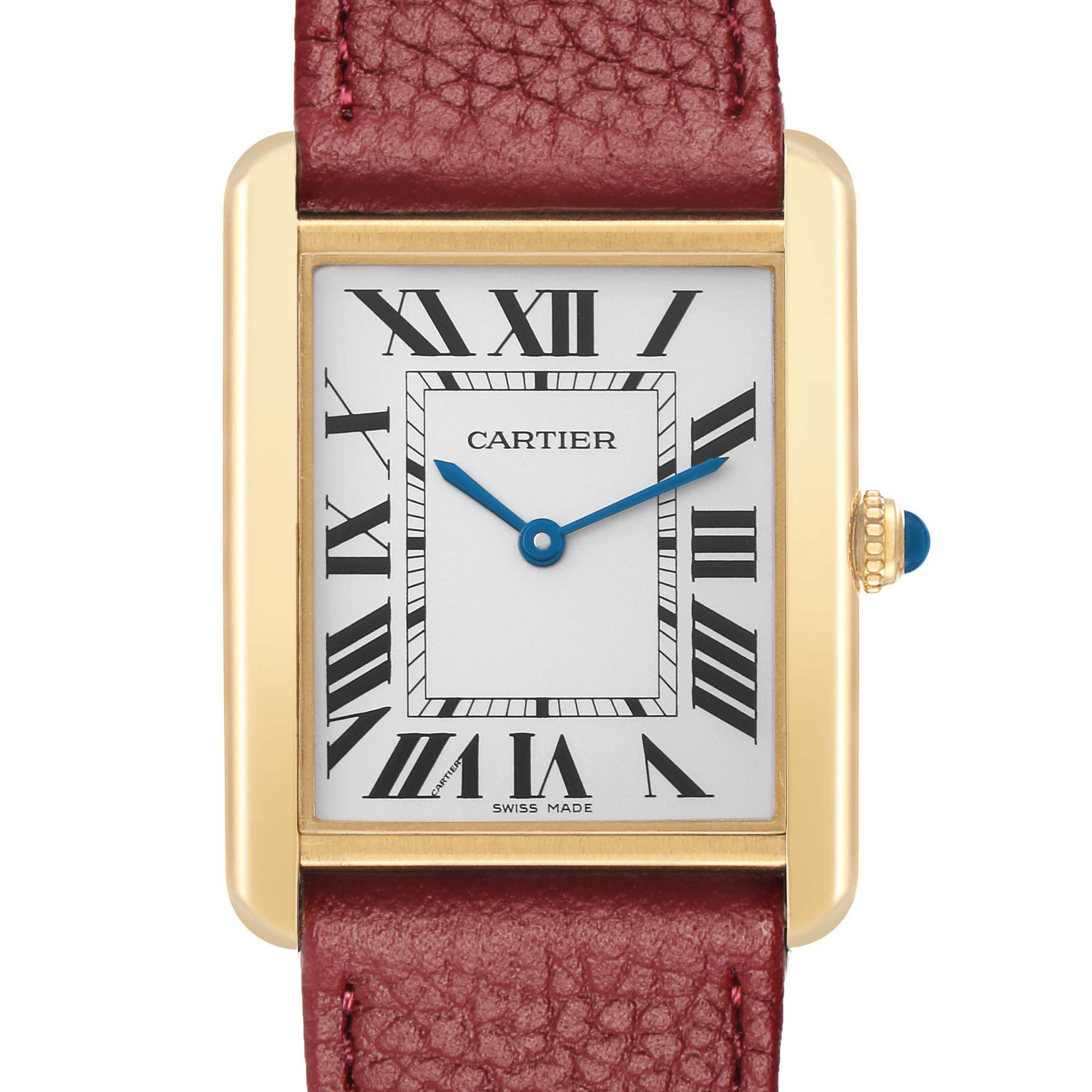 The Cartier Tank Solo W1018855 Men's Yellow Gold Silver Dial is shown from the front, highlighting the dial, hands, case, and crown, with a red leather strap.