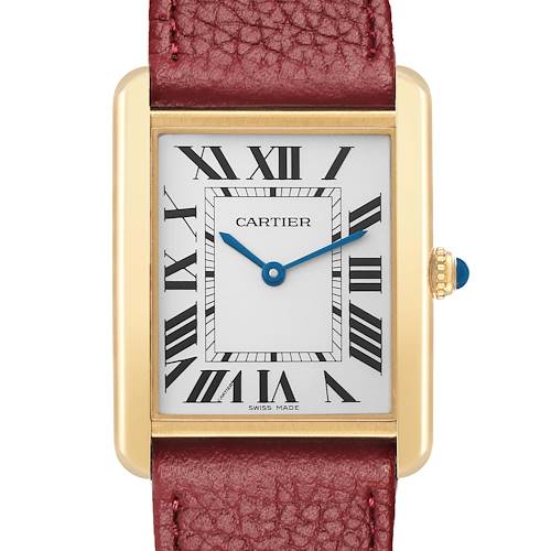 The Cartier Tank Solo W1018855 Men's Yellow Gold Silver Dial watch is shown from a front angle, highlighting its gold case, Roman numeral dial, and red leather strap.