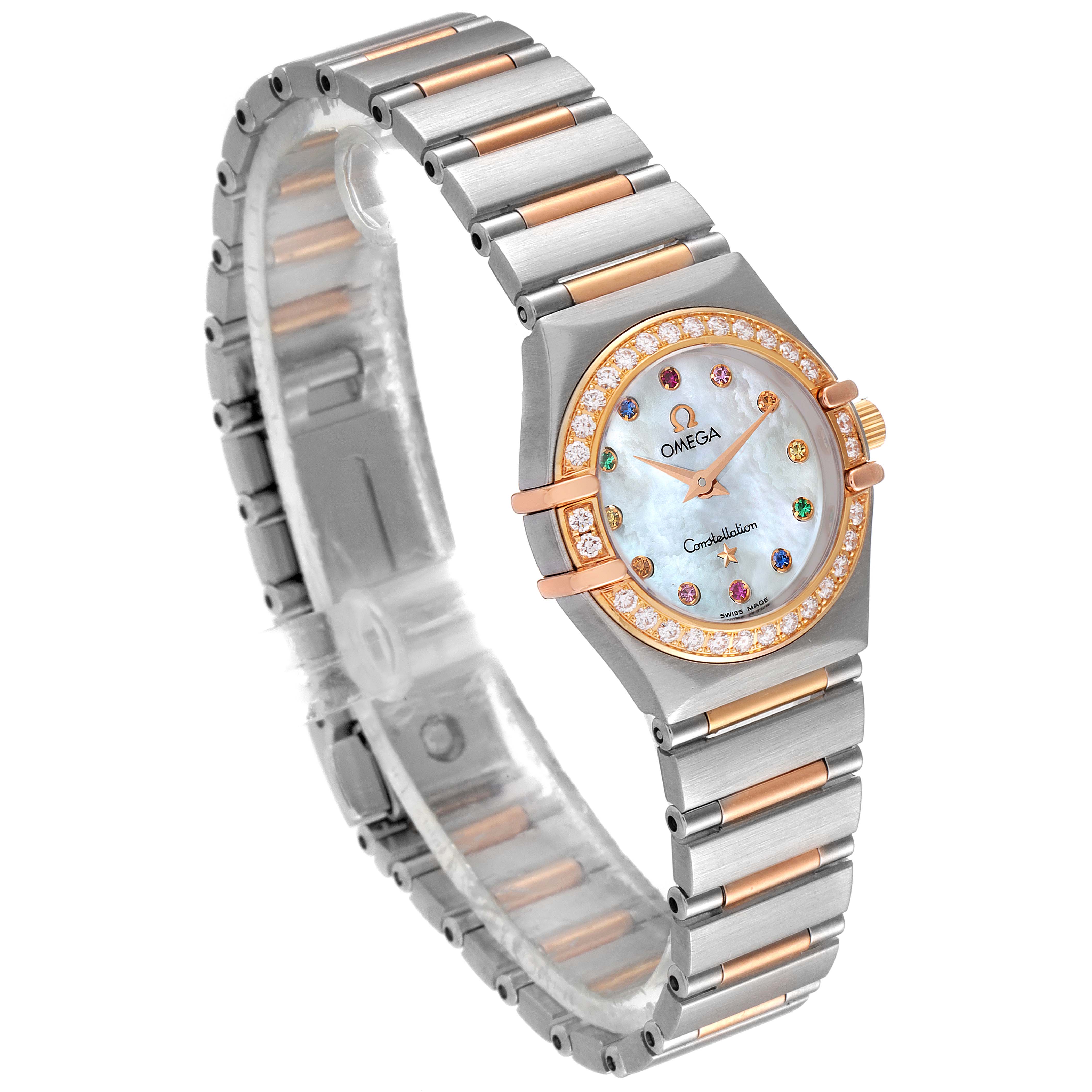 The image shows an angled view of the Omega 1365.79.00 Women
s Steel and Gold (two tone) Mother of Pearl Dial 1365.79.00 Women
s Steel and Gold (two tone) Mother of Pearl Dial Constellation Iris Steel Rose Gold Multi Stone Ladies Watch 1365.79.00, highlighting the face, strap, and bezel.