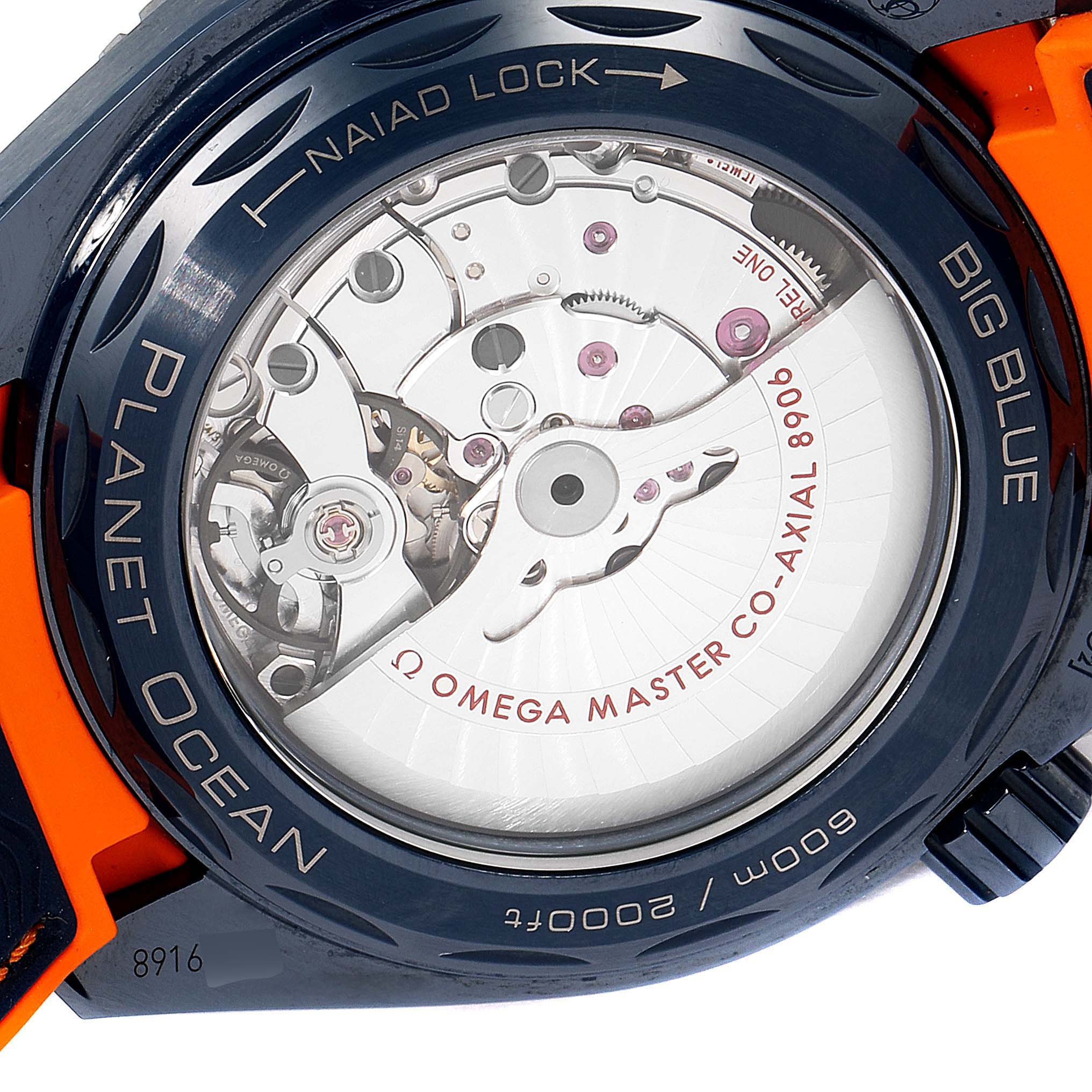This image shows the case back of the Omega Planet Ocean 215.92.46.22.03.001 Men's Stainless Steel Blue Dial 215.92.46.22.03.001 Men's Stainless Steel Blue Dial watch, highlighting the movement and Naiad Lock system.