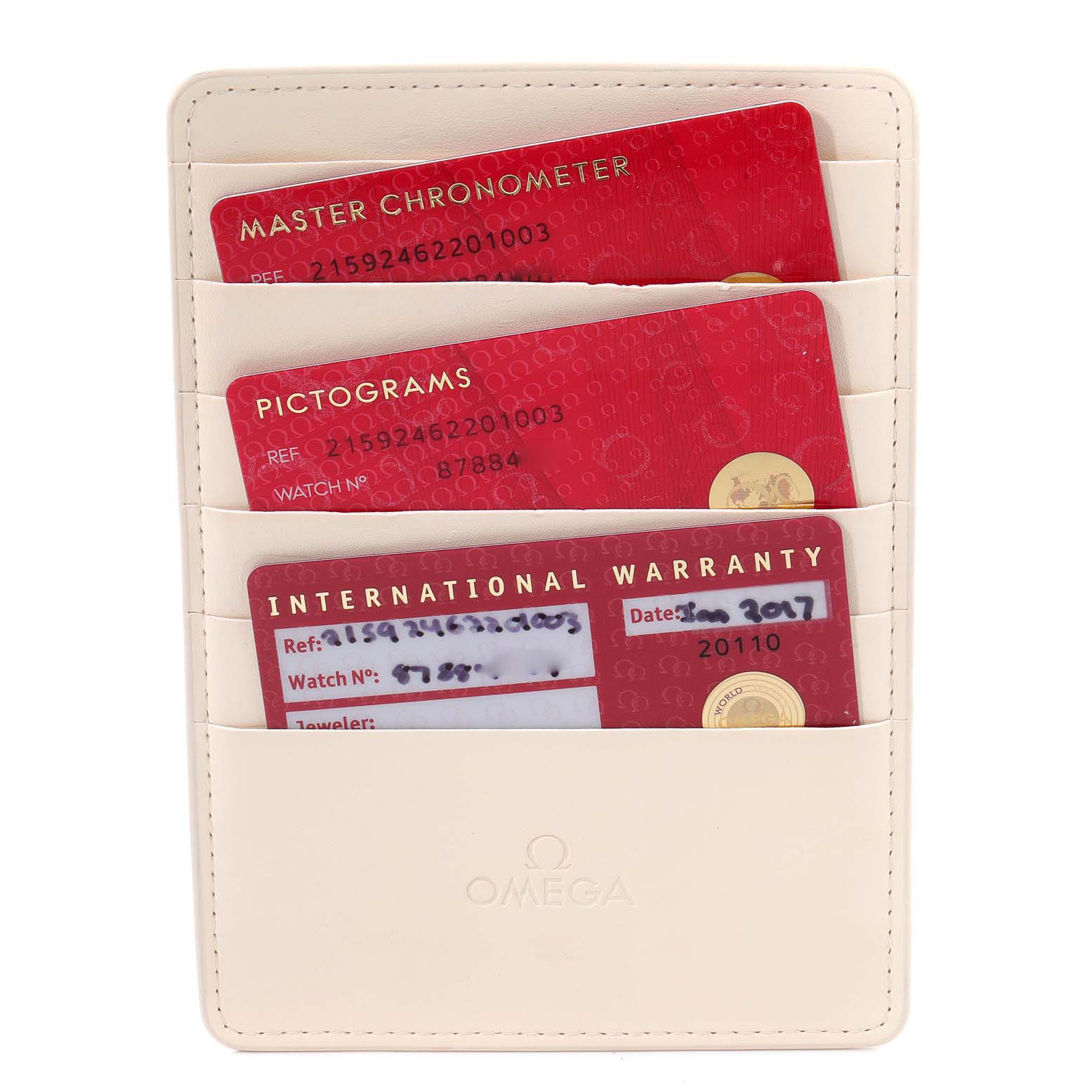 The image shows warranty and certification cards placed in a cream cardholder for an Omega Planet Ocean 215.92.46.22.01.003 Men's Ceramic Black Dial 215.92.46.22.01.003 Men's Ceramic Black Dial watch.