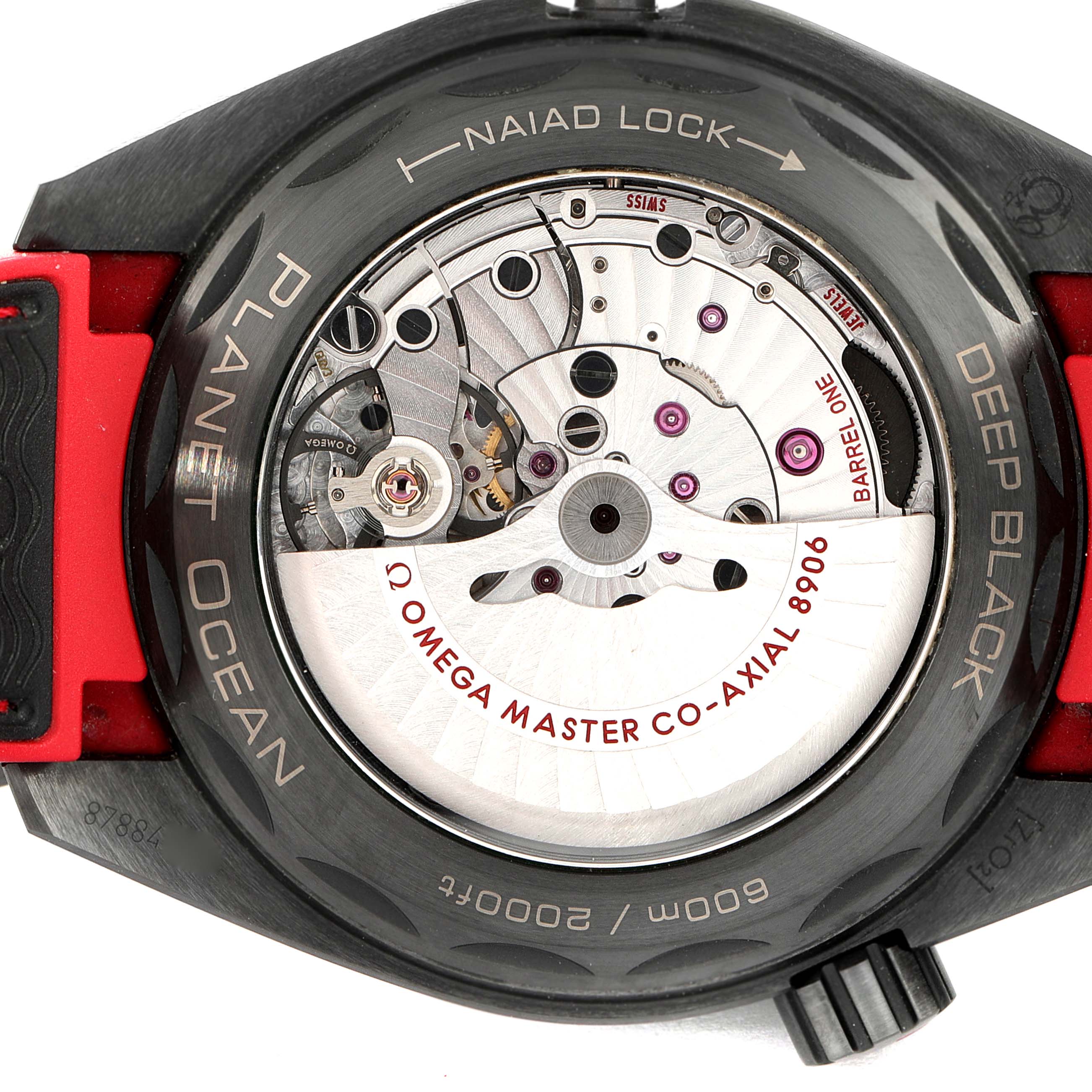 The image shows the back view of an Omega Planet Ocean 215.92.46.22.01.003 Men's Ceramic Black Dial 215.92.46.22.01.003 Men's Ceramic Black Dial watch, revealing the intricate movement and "OMEGA MASTER CO-AXIAL 8906" inscription.