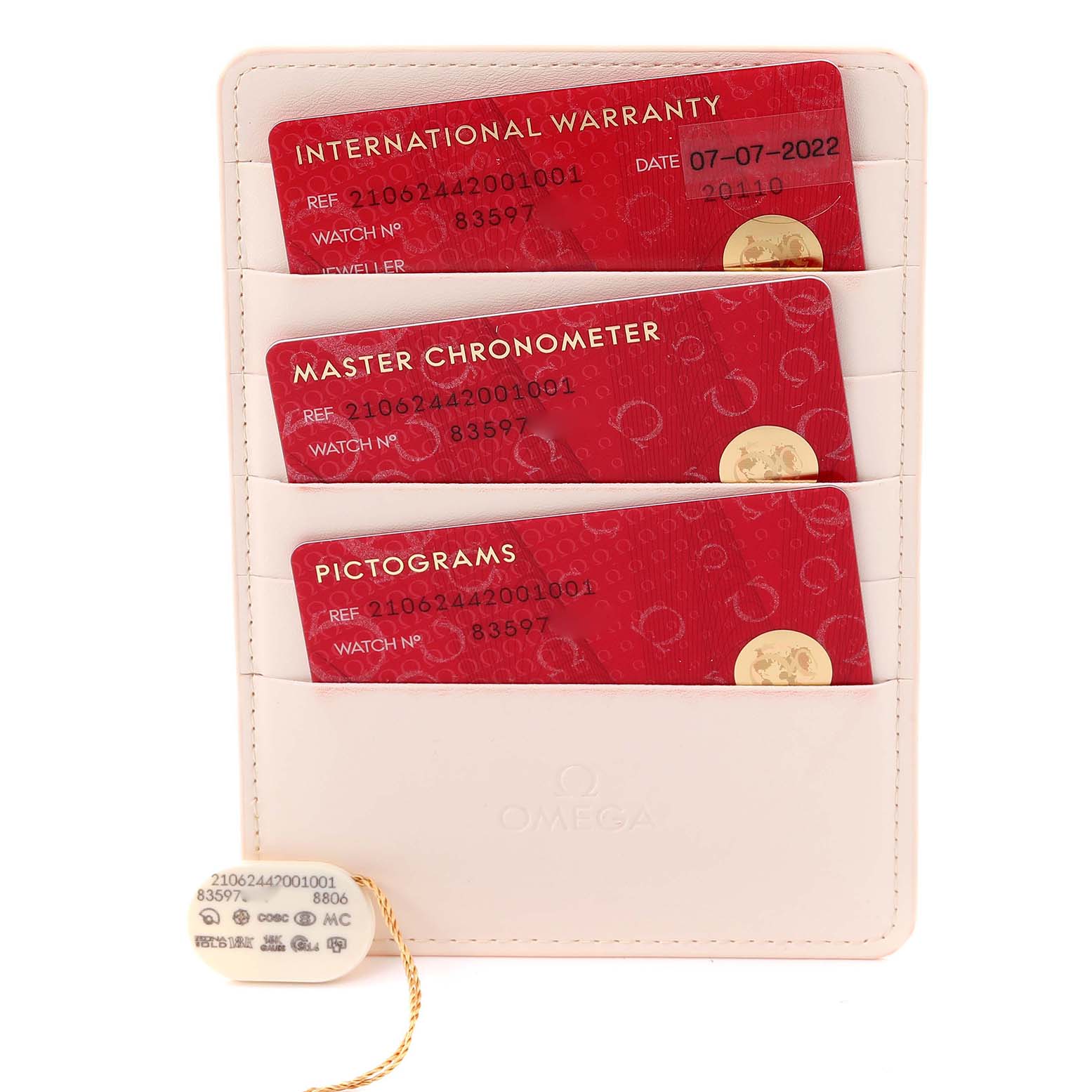 The image shows warranty cards and an information tag for the Omega Seamaster 210.62.44.20.01.001 Men's Ceramic Black Dial 210.62.44.20.01.001 Men's Ceramic Black Dial model.