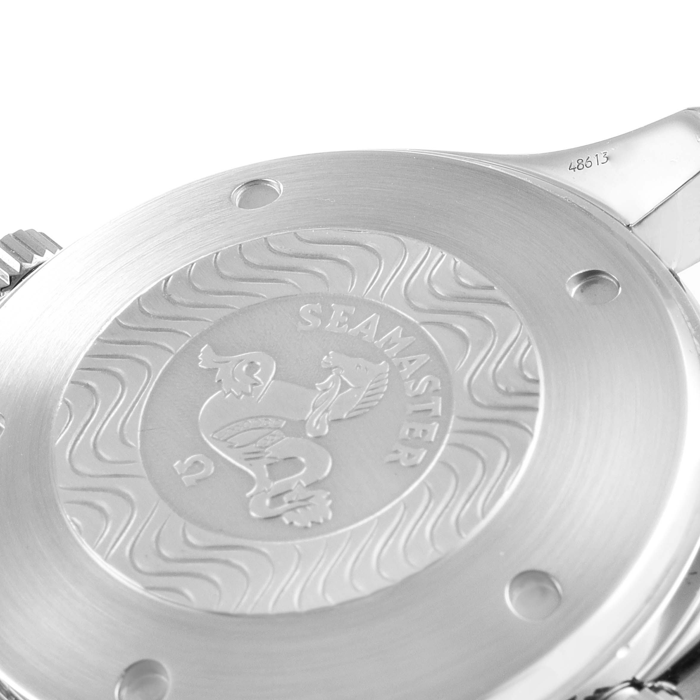 The image shows the case back of an Omega Seamaster 2599.80.00 Men's Stainless Steel Blue Dial 2599.80.00 Men's Stainless Steel Blue Dial watch, featuring engraved branding and a wave pattern.