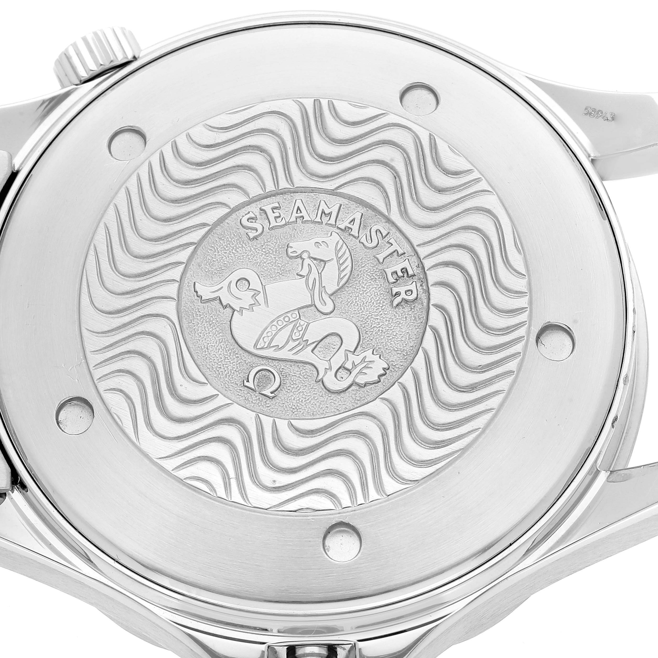 The image shows the back case of an Omega Seamaster 2265.80.00 Men's Stainless Steel Blue Dial 2265.80.00 Men's Stainless Steel Blue Dial watch from a close-up angle, displaying its engraved design and crown.