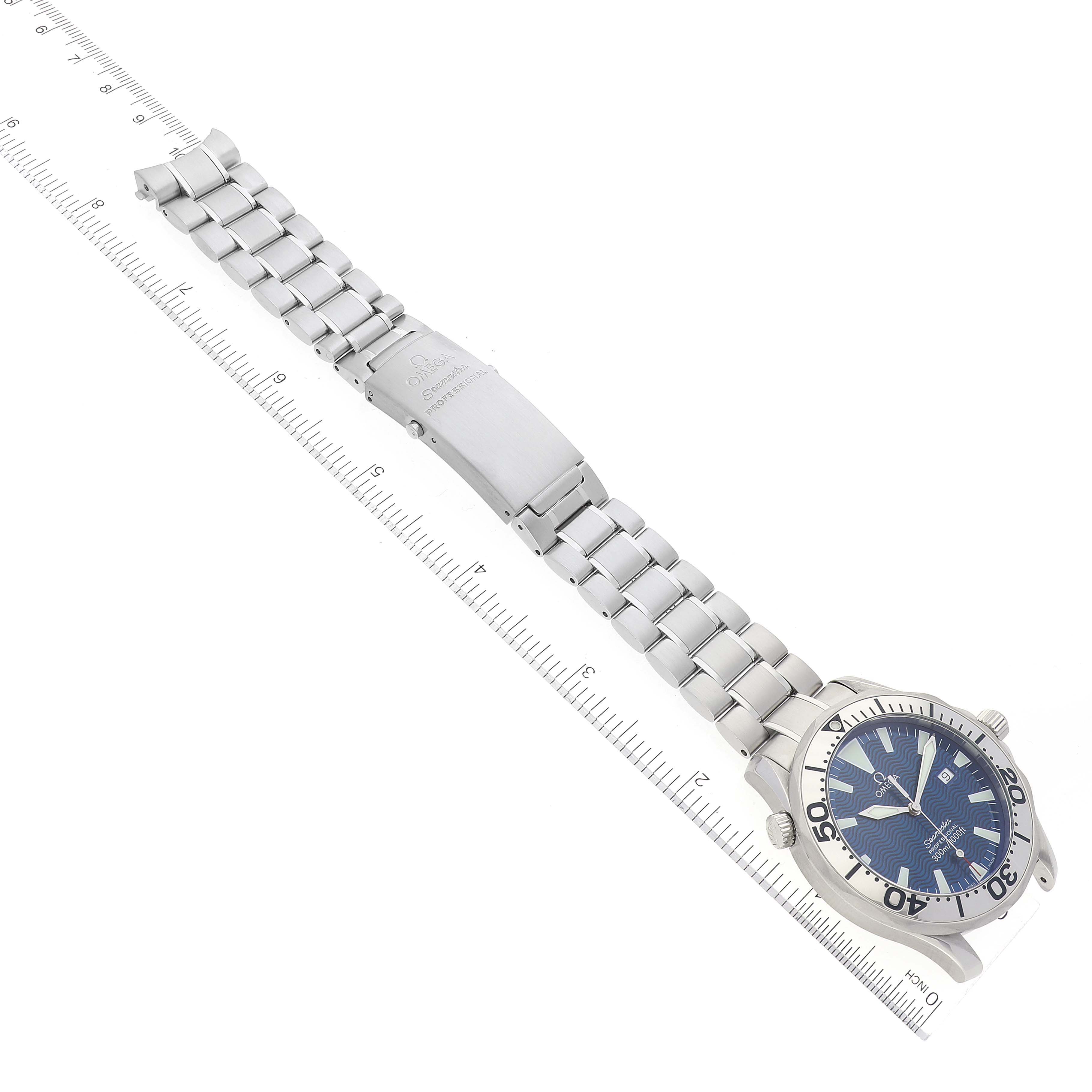 The Omega Seamaster 2265.80.00 Men's Stainless Steel Blue Dial 2265.80.00 Men's Stainless Steel Blue Dial watch is shown from a top-down angle, displaying its face, bezel, and metal bracelet with a deployment clasp.