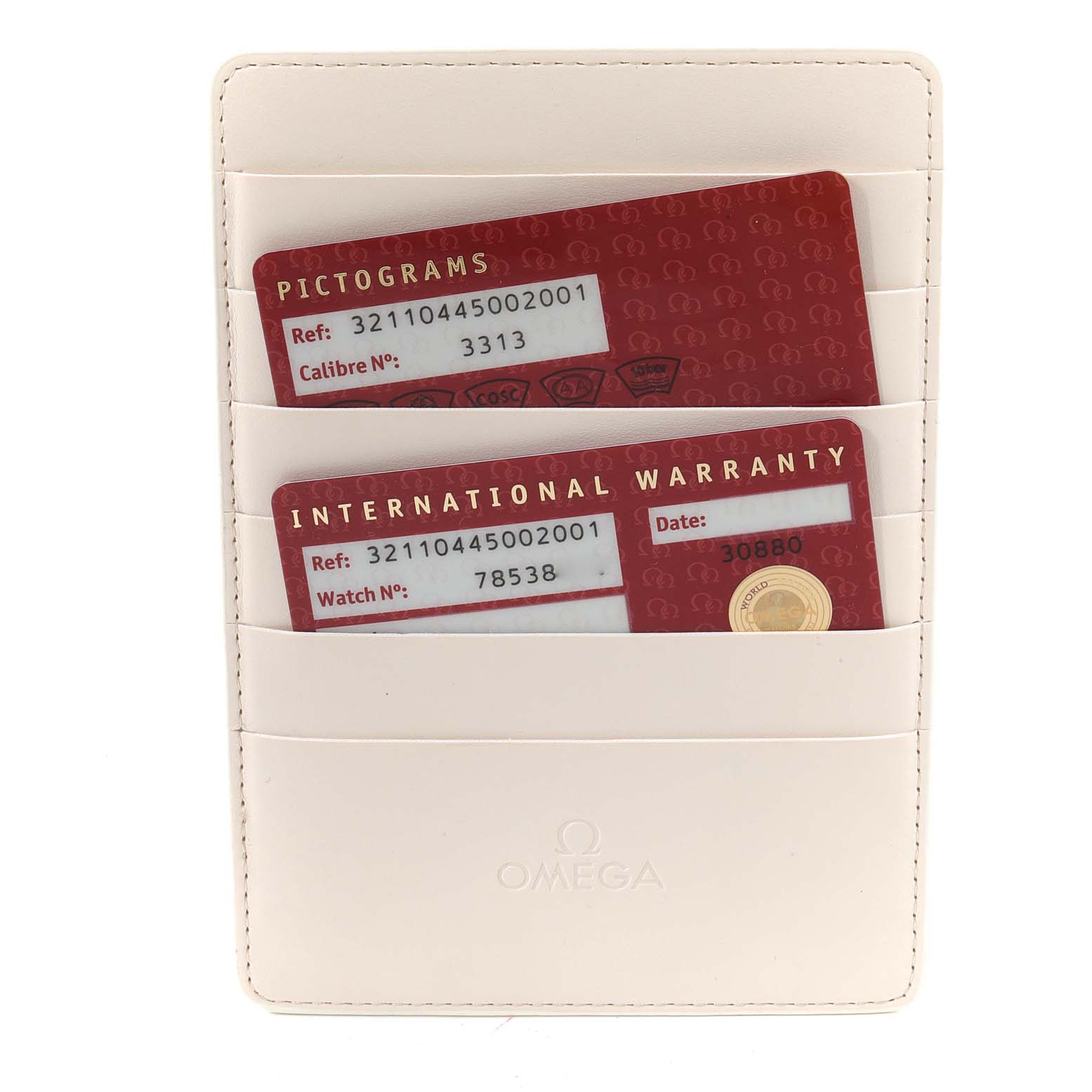 The image shows Omega Speedmaster 321.10.44.50.02.001 Men
s Stainless Steel Silver Dial 321.10.44.50.02.001 Men
s Stainless Steel Silver Dial model documentation, including warranty and pictogram cards, in a white cardholder.