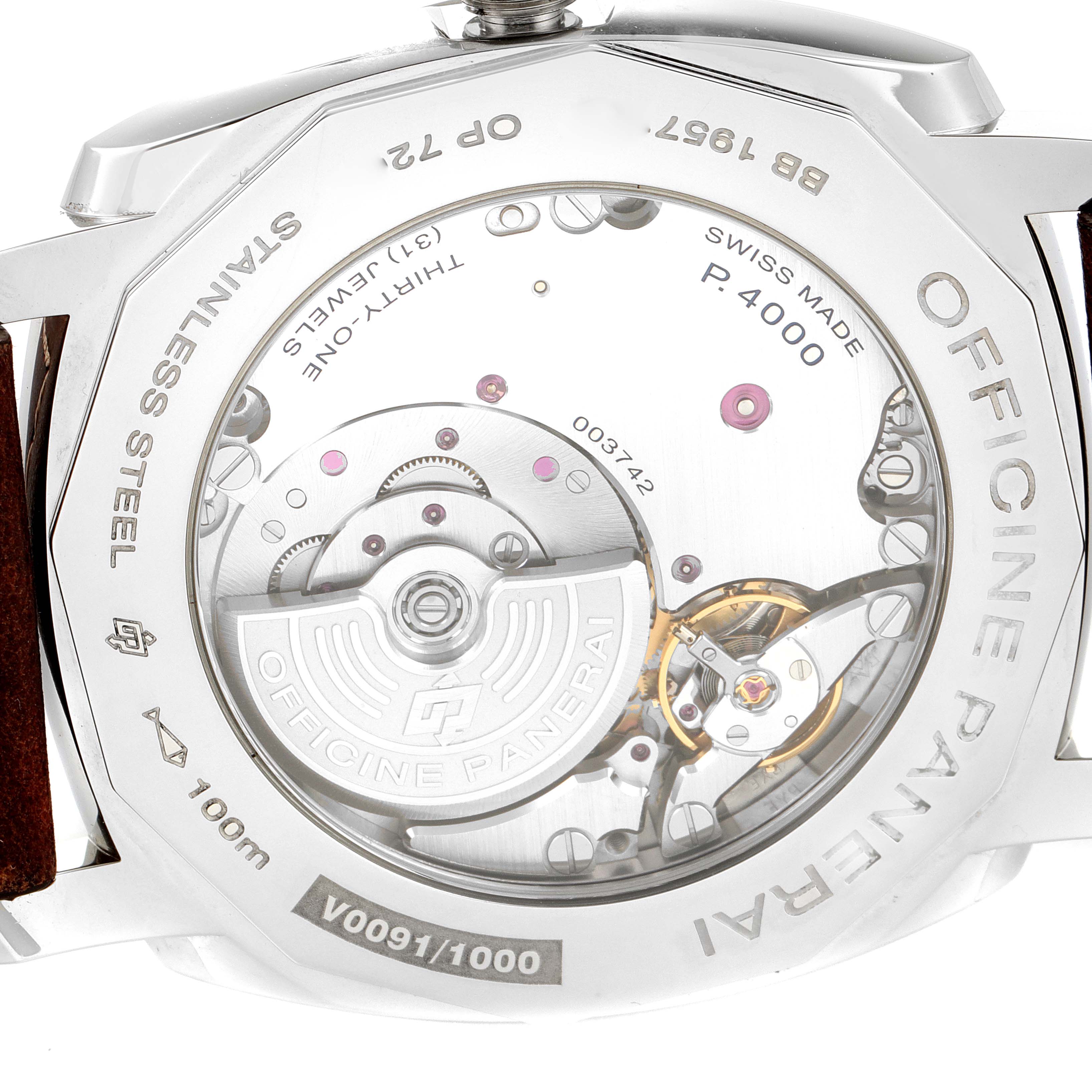 The image shows the case back of a Panerai Radiomir PAM00995 Men
s Stainless Steel Green Dial PAM00995 Men
s Stainless Steel Green Dial watch, highlighting its internal movement and components.