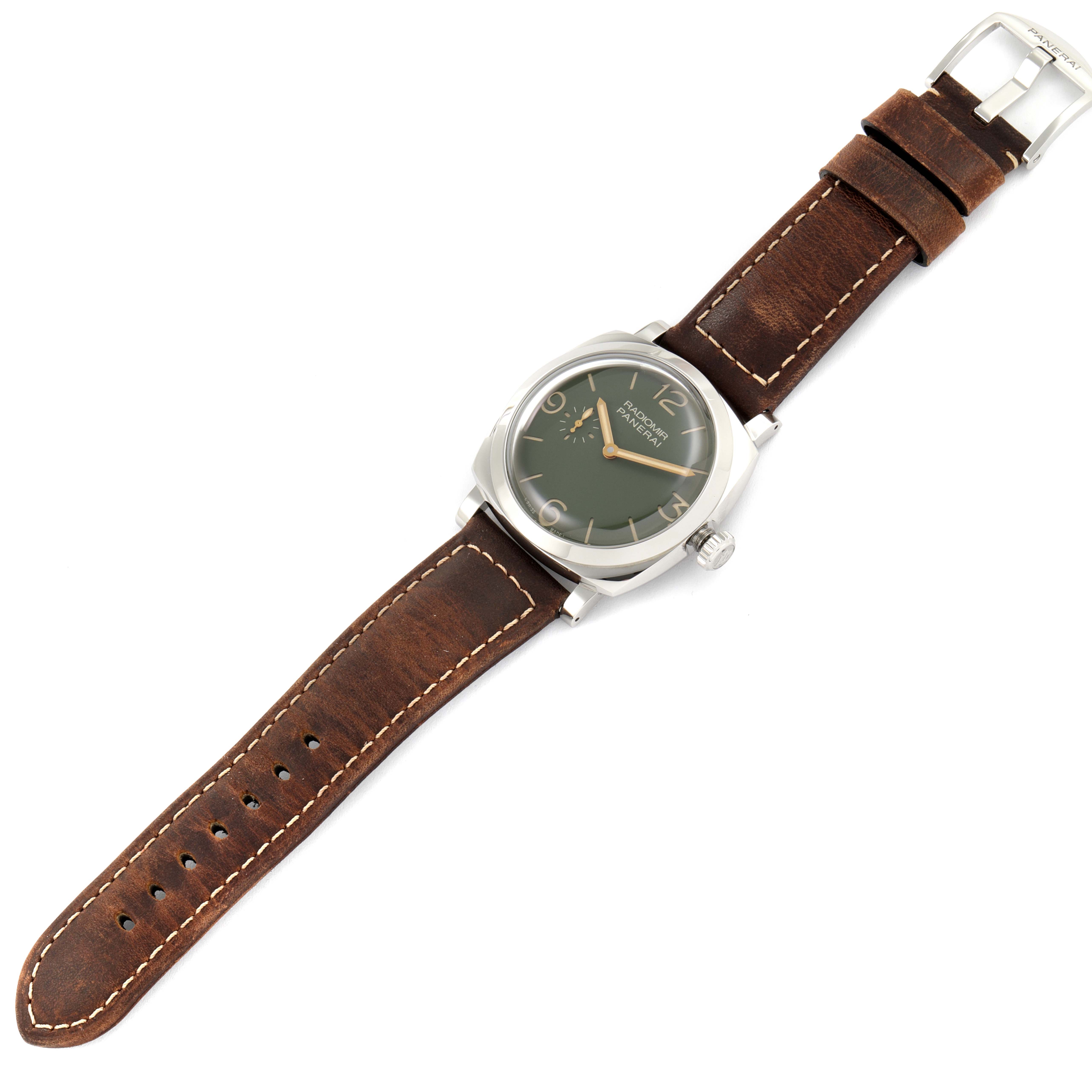 The image shows a Panerai Radiomir PAM00995 Men
s Stainless Steel Green Dial PAM00995 Men
s Stainless Steel Green Dial watch from a top-down angle, highlighting its dial, case, crown, and brown leather strap.