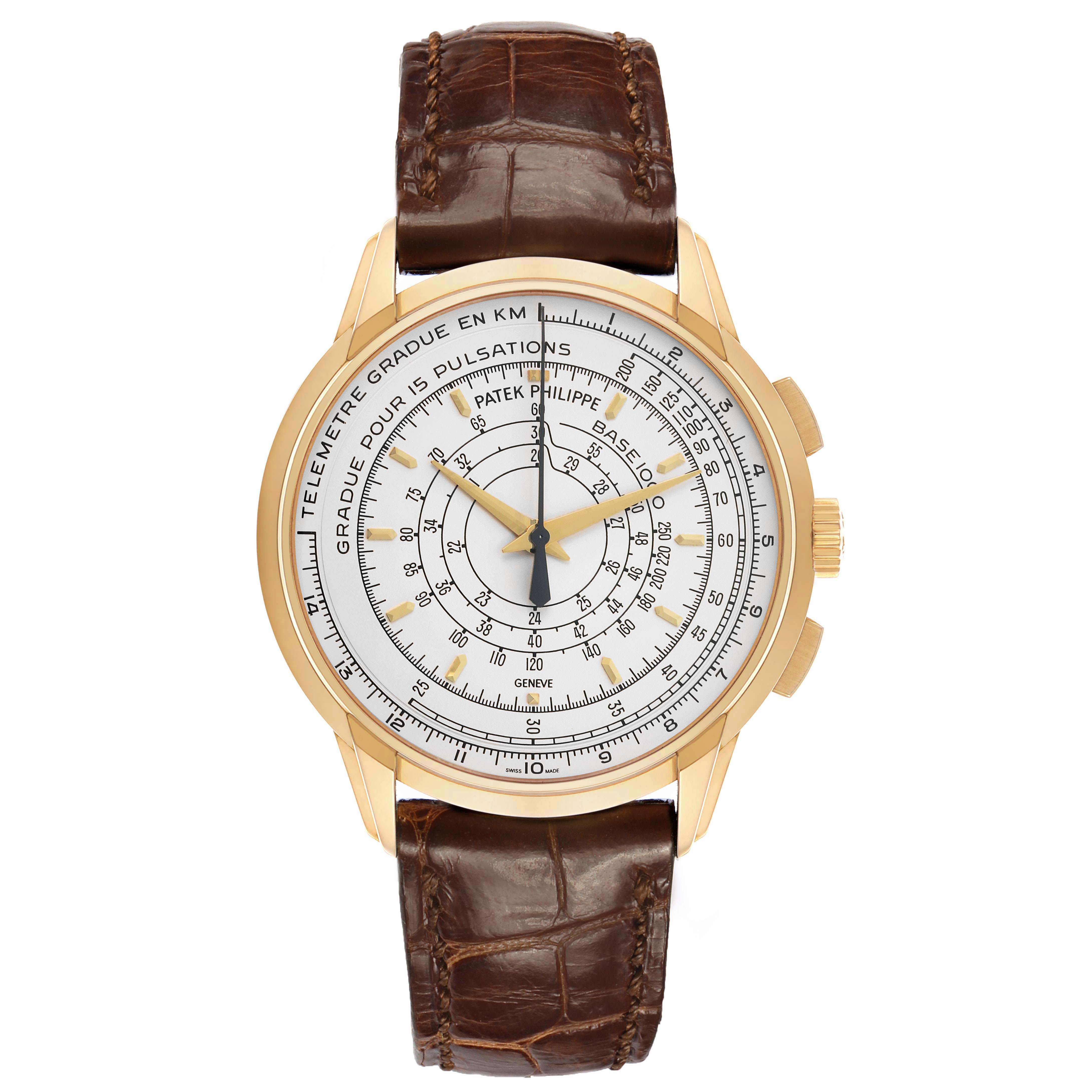 The Patek Philippe Complications 5975J-001 Men's Yellow Gold Silver Dial watch is shown from a top-down angle, highlighting the dial, case, and brown leather strap.