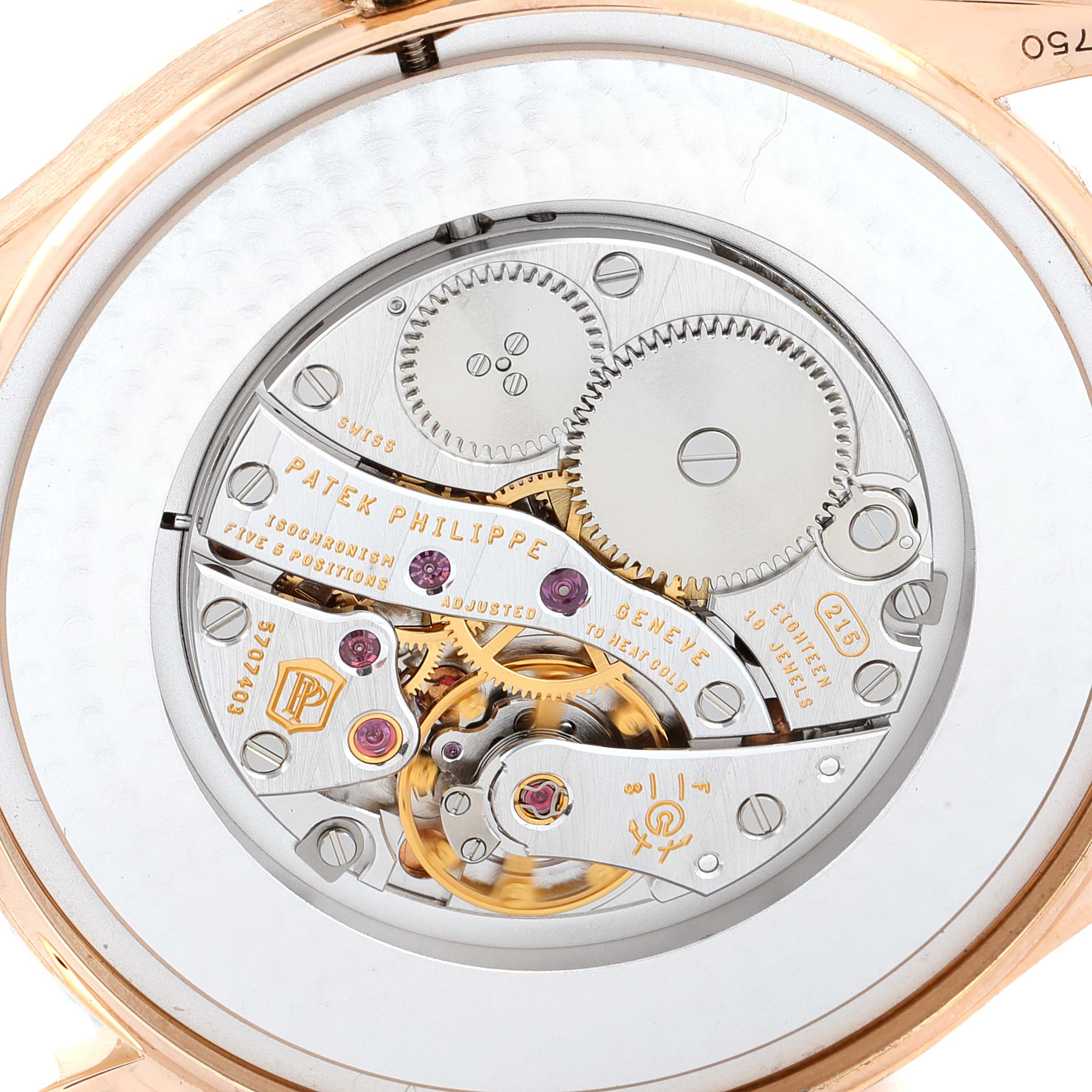 The image shows the back view of the Patek Philippe Calatrava 5196R Men's Rose Gold Silver Dial 5196R Men's Rose Gold Silver Dial, exposing the intricate internal movement mechanism.